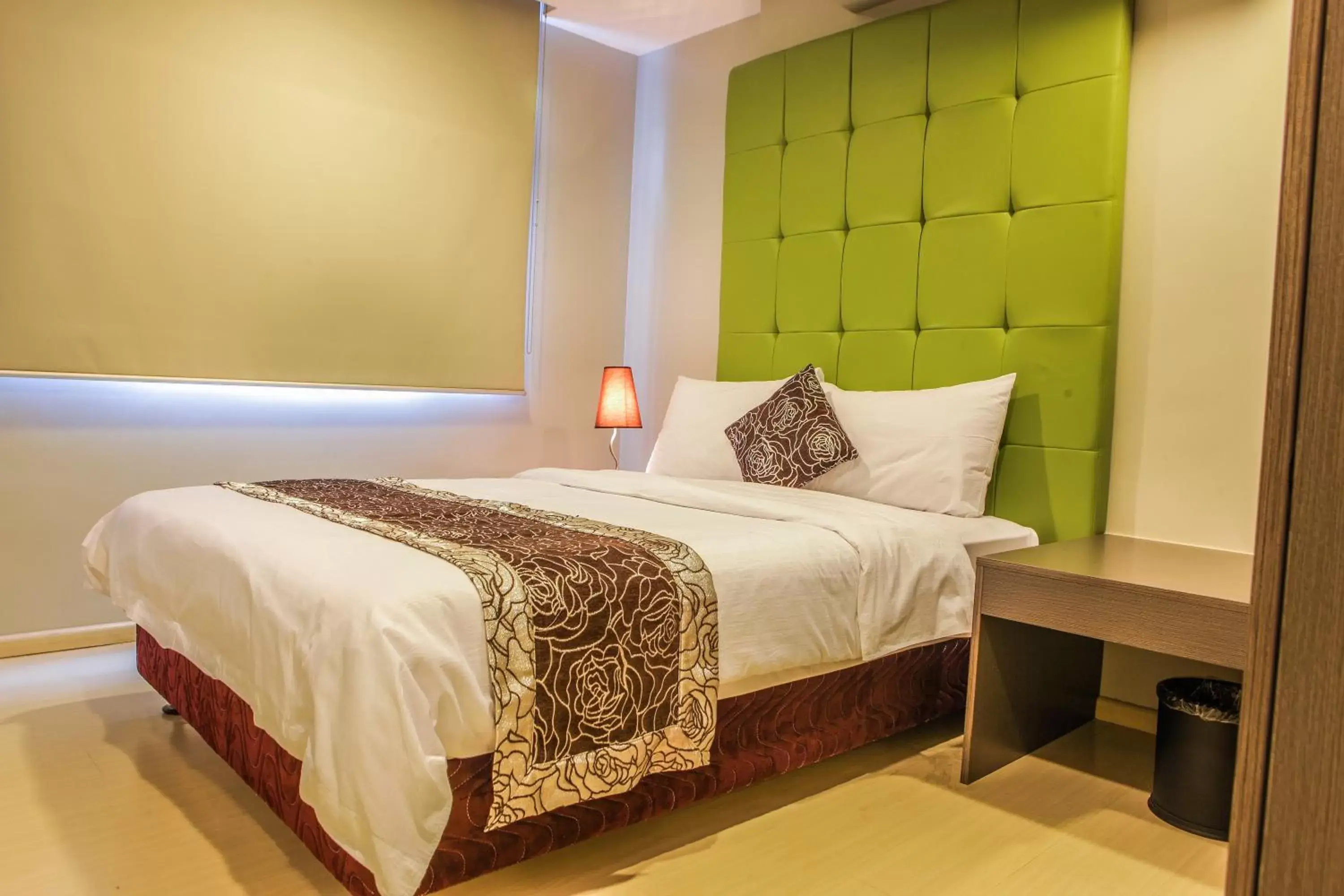 Bed in The Exchange Regency Residence Hotel Managed by HII