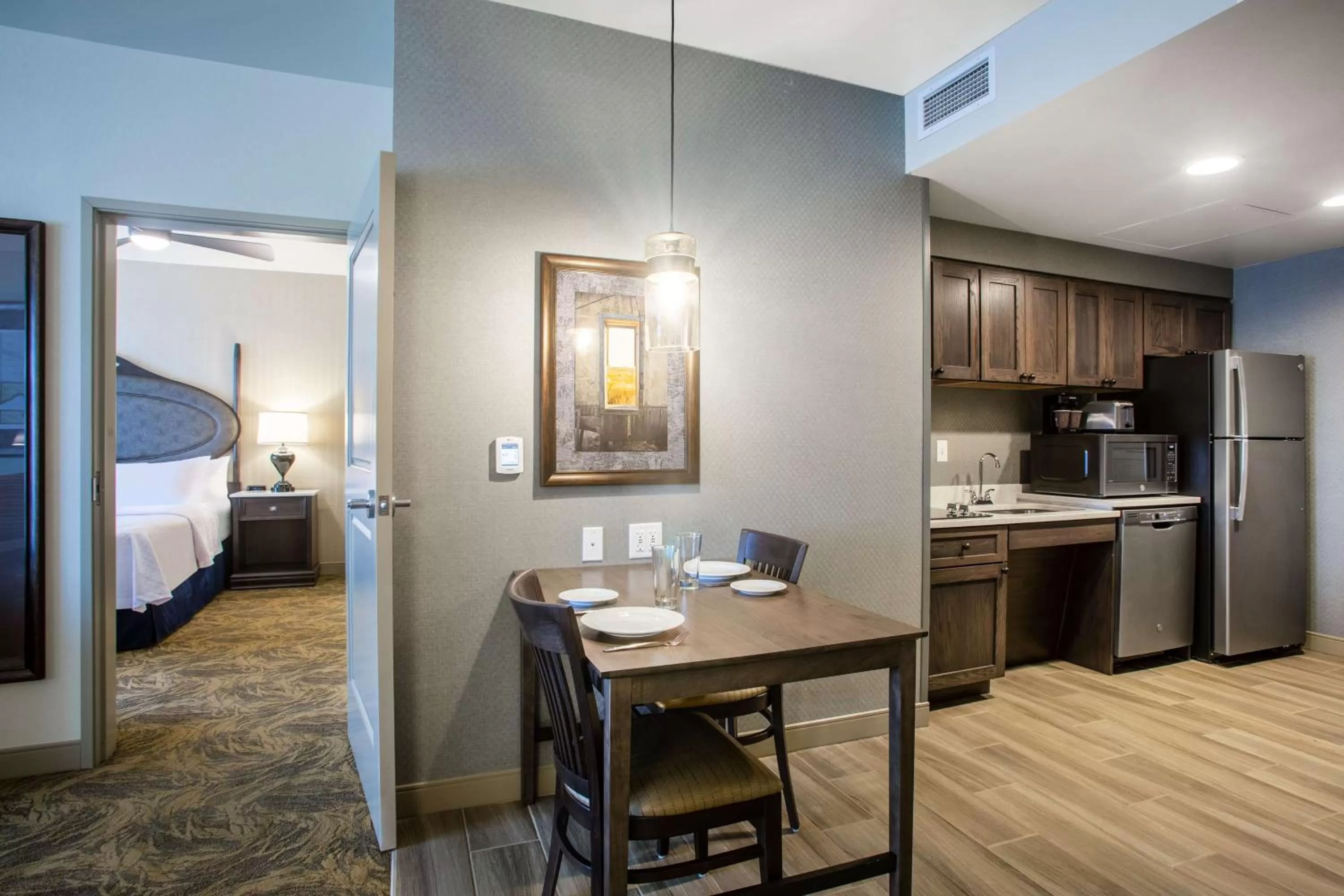 Kitchen or kitchenette, Bed in Homewood Suites By Hilton Salina/Downtown, Ks