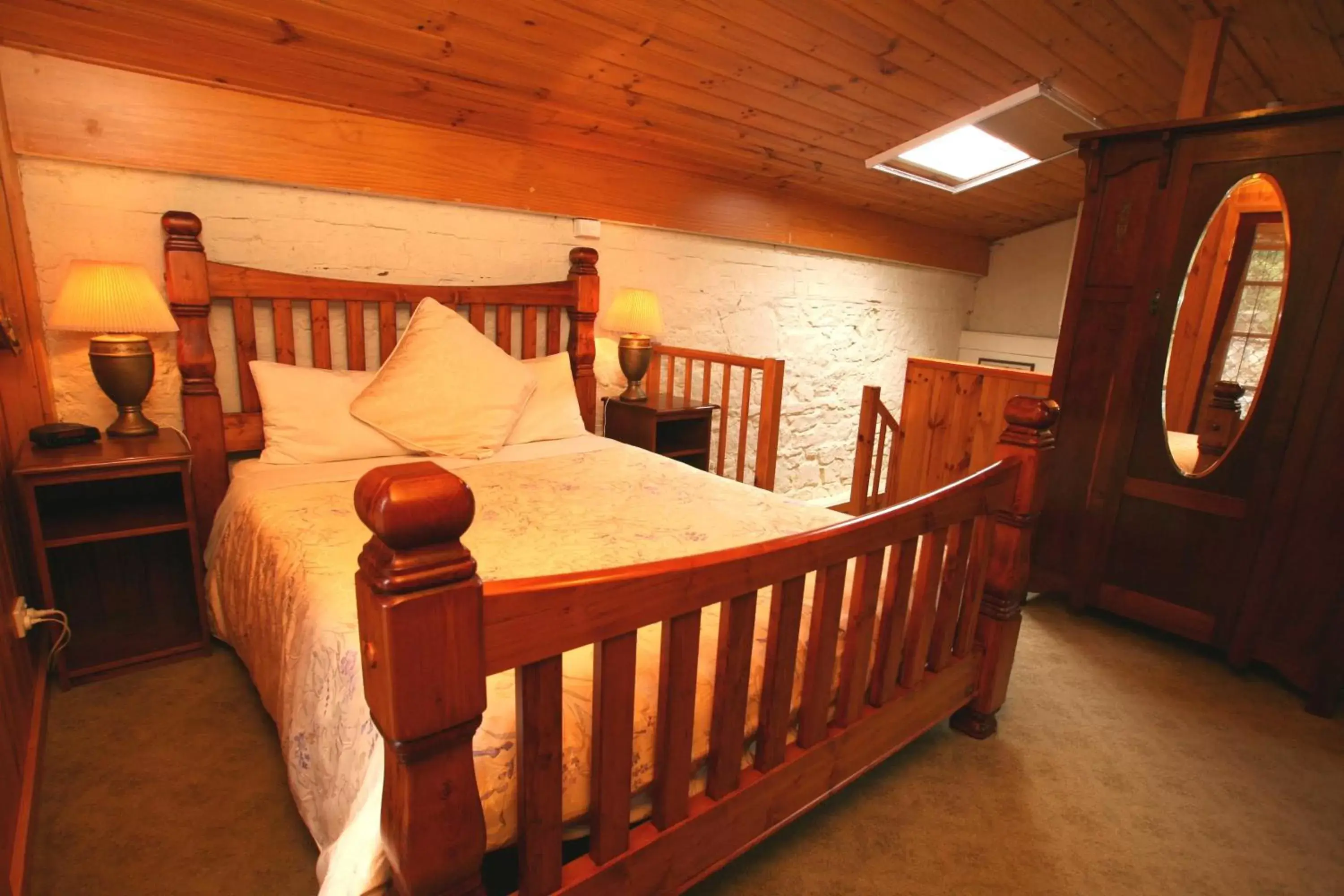 Bed in The Lodge on Elizabeth Boutique Hotel