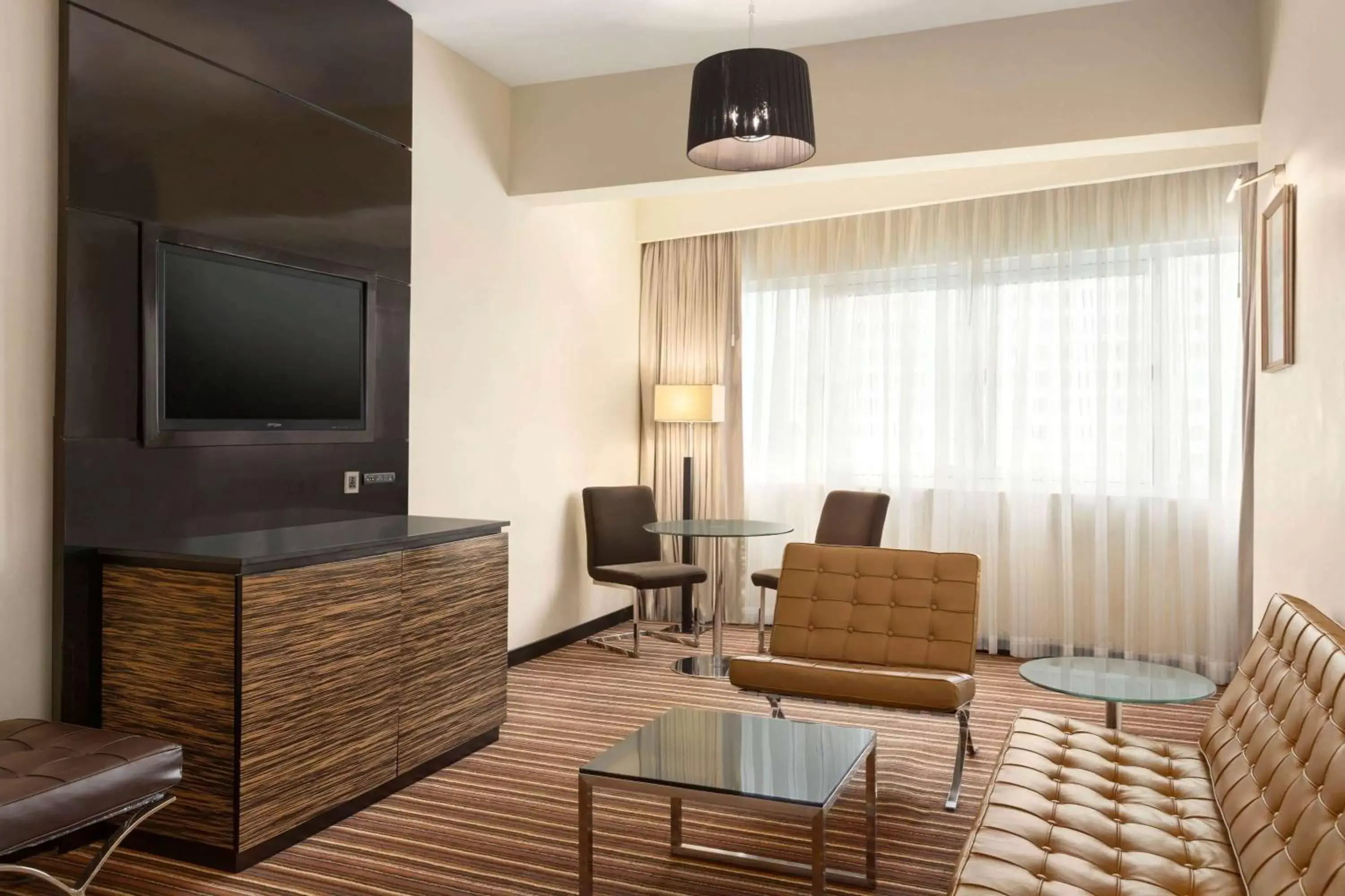 Photo of the whole room, TV/Entertainment Center in Ramada Colombo