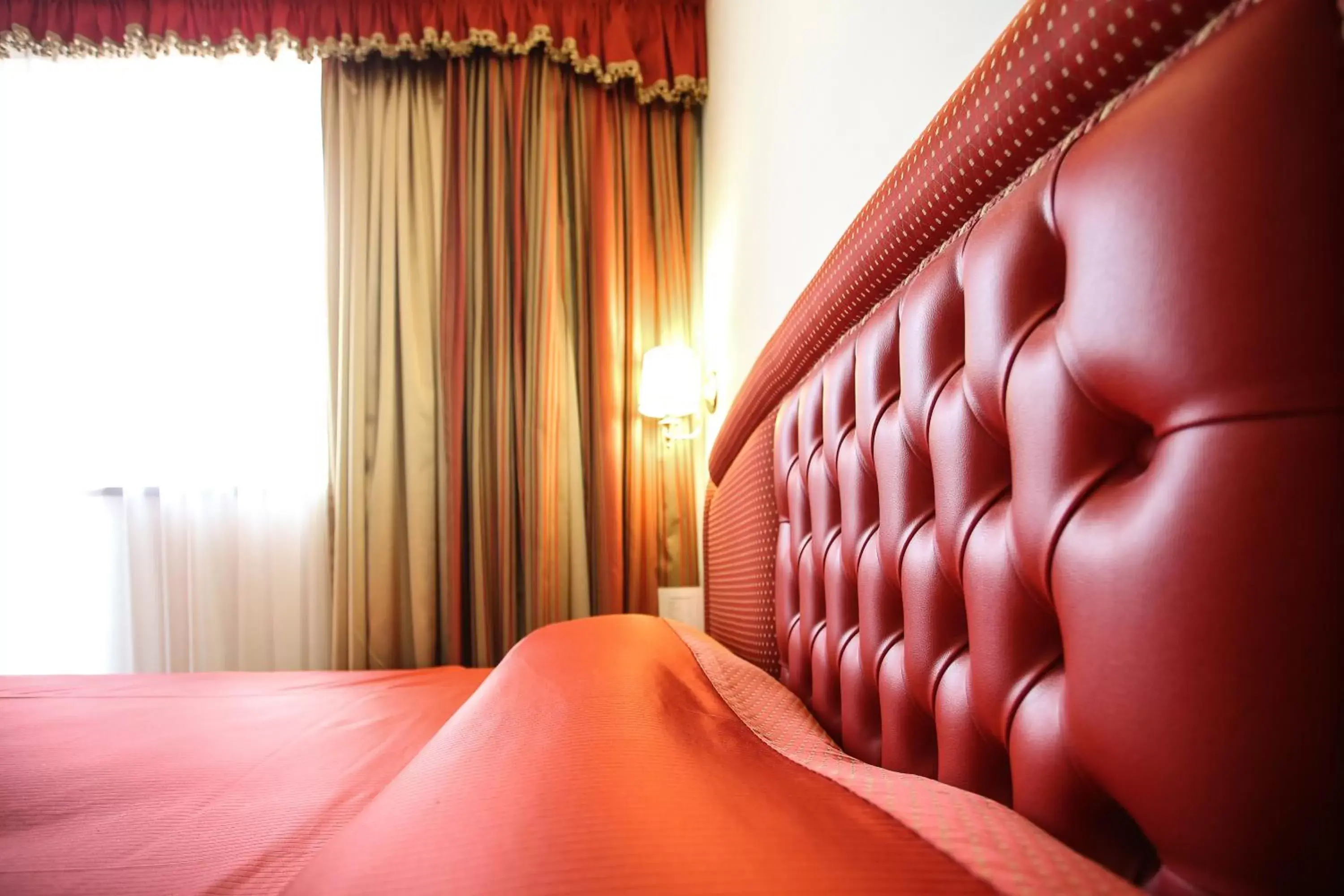 Bed in Sartori's Hotel