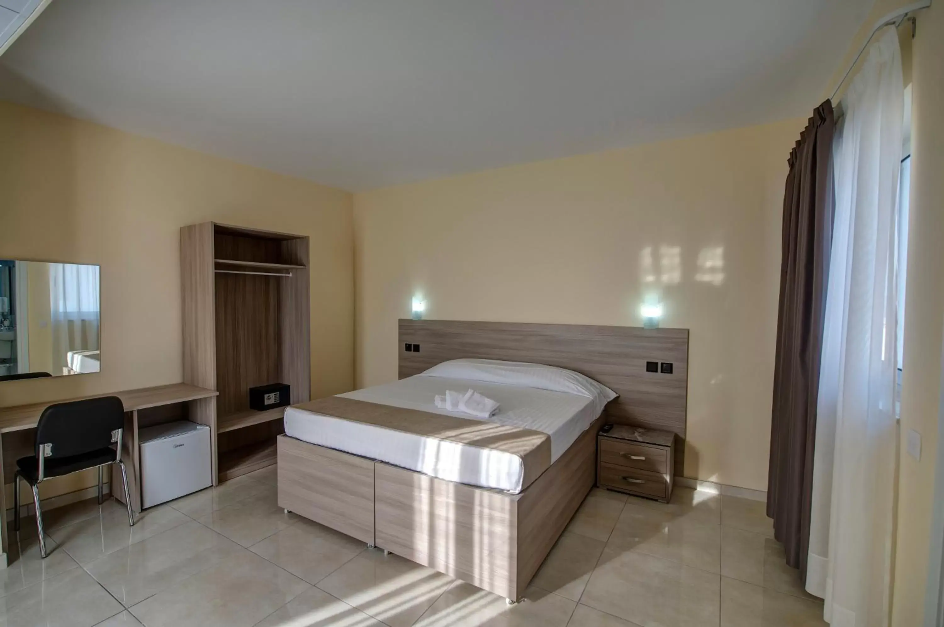 Bed in Allegro Hotel Bed in Allegro Hotel