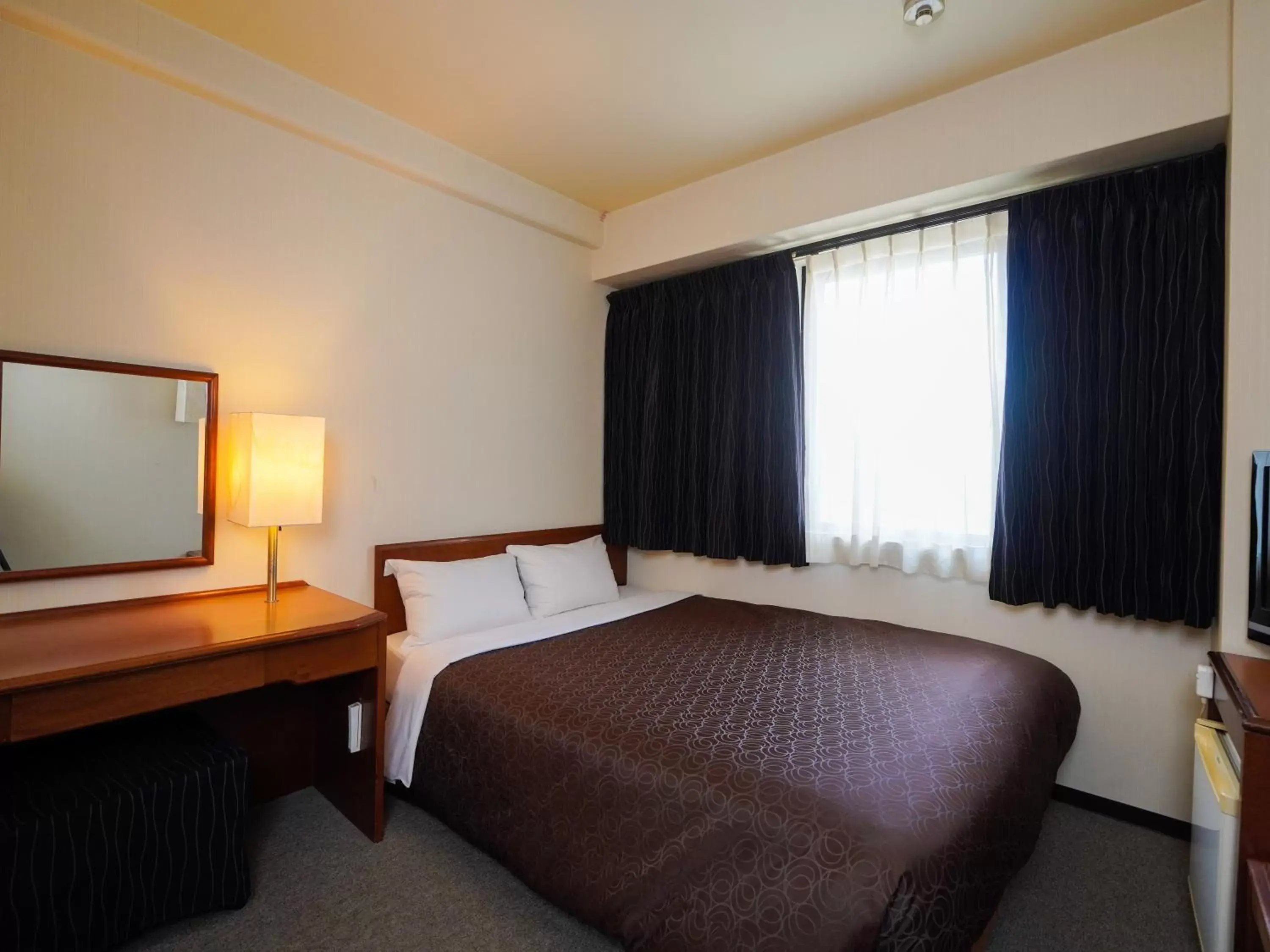 Bed in Plaza Hotel Tenjin