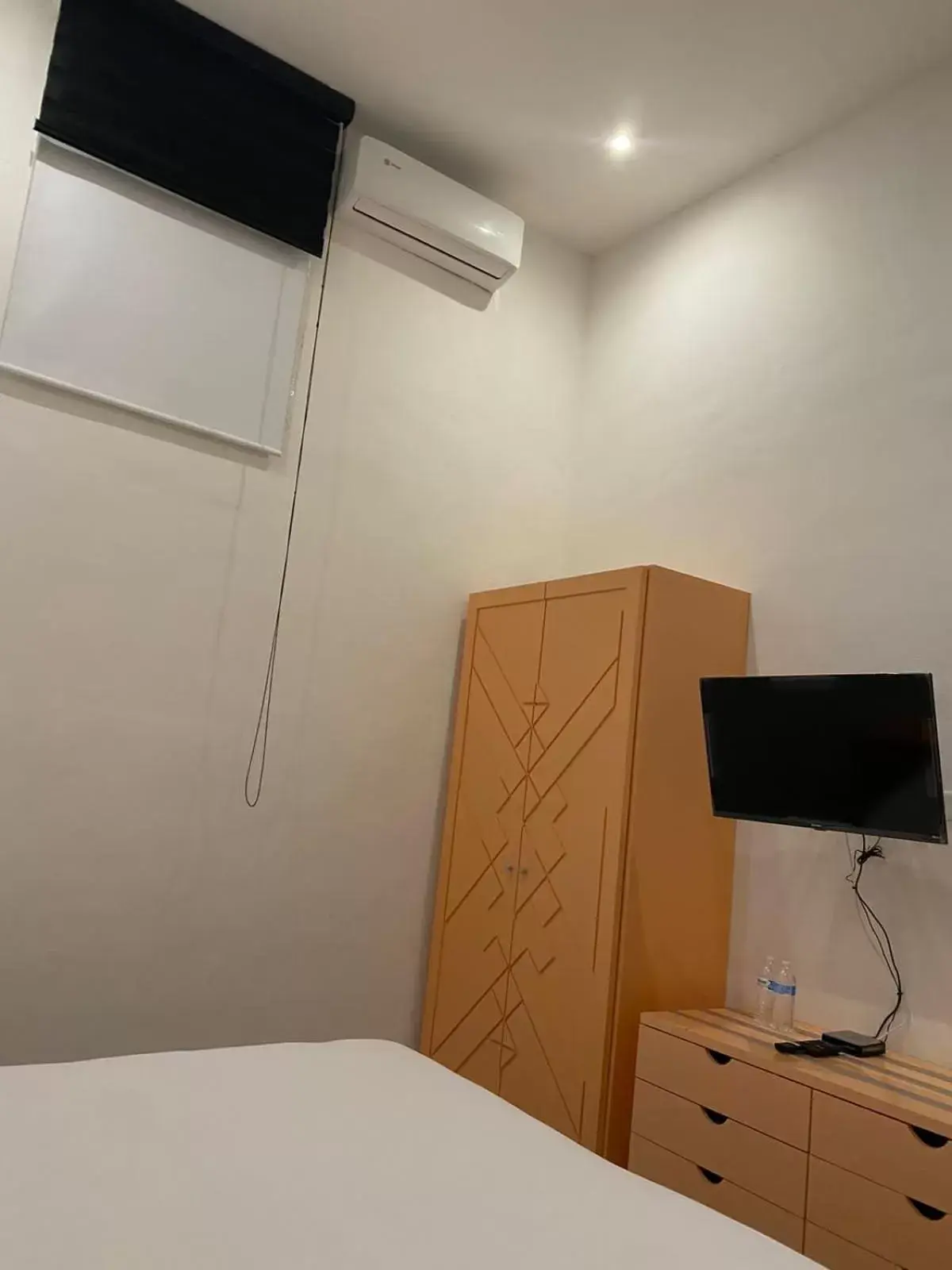 Bedroom, TV/Entertainment Center in WINDAY HOTEL - Cerca 5a Avenida