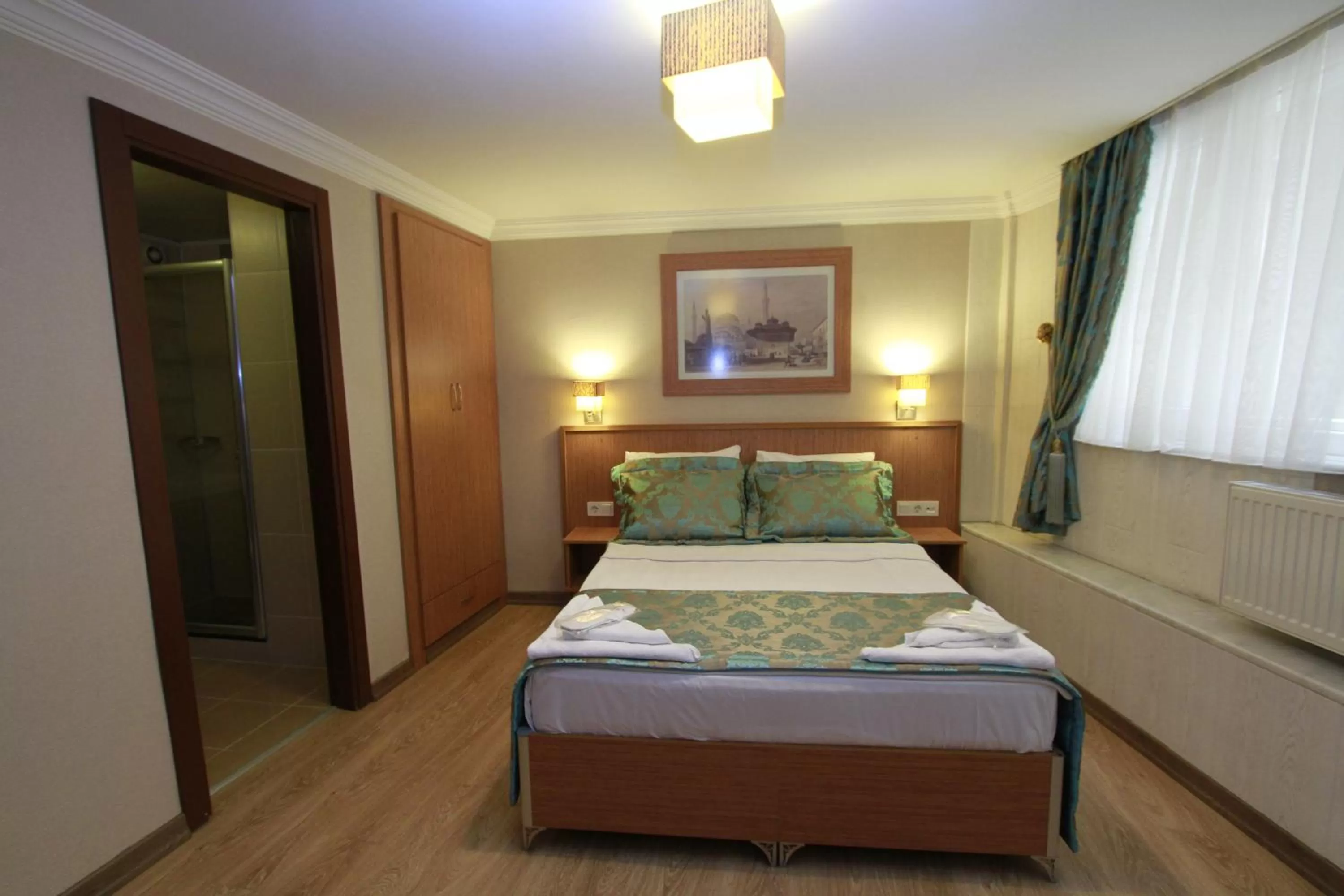 Bed in Agora Boutique Hotel & Bistro