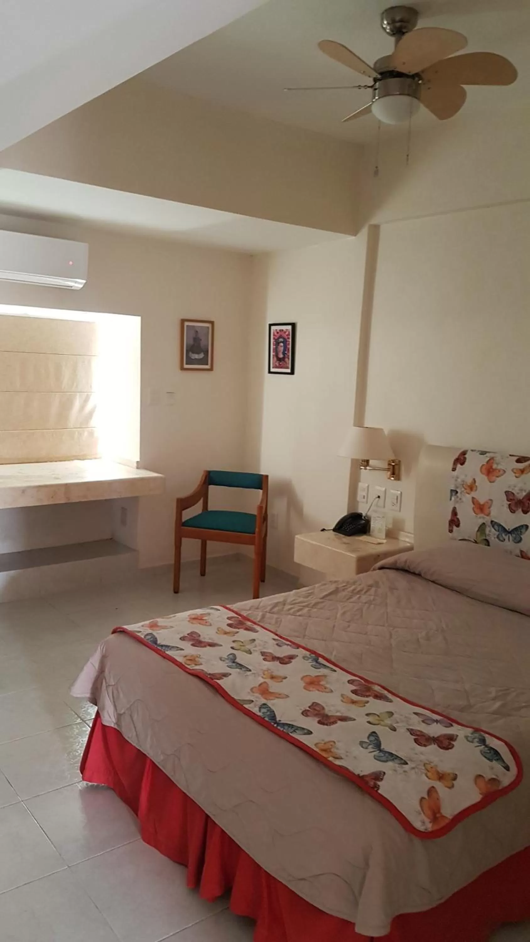 Bed in Hotel y Suites Nader