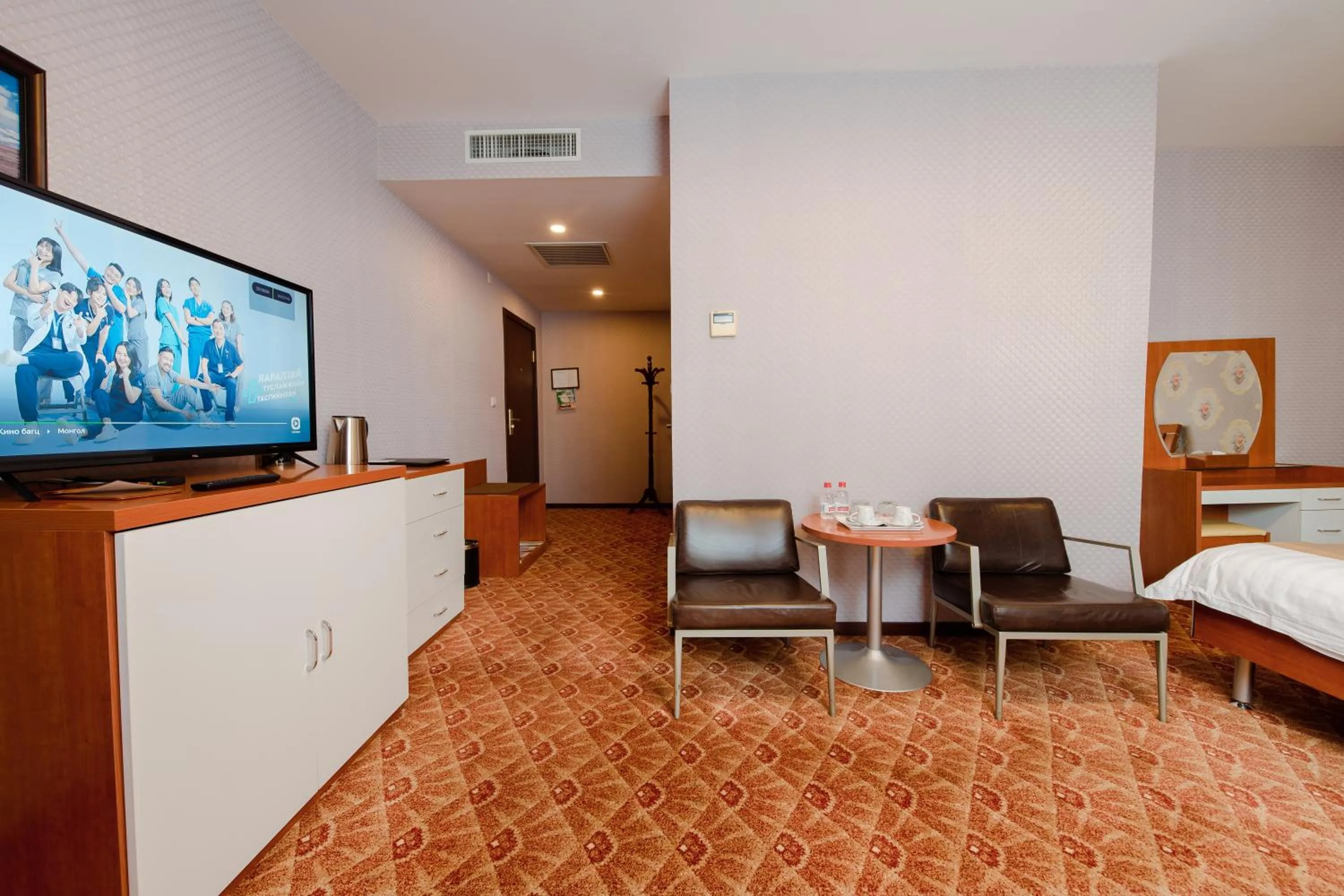 Seating area, Bed in Springs Hotel Ulaanbaatar