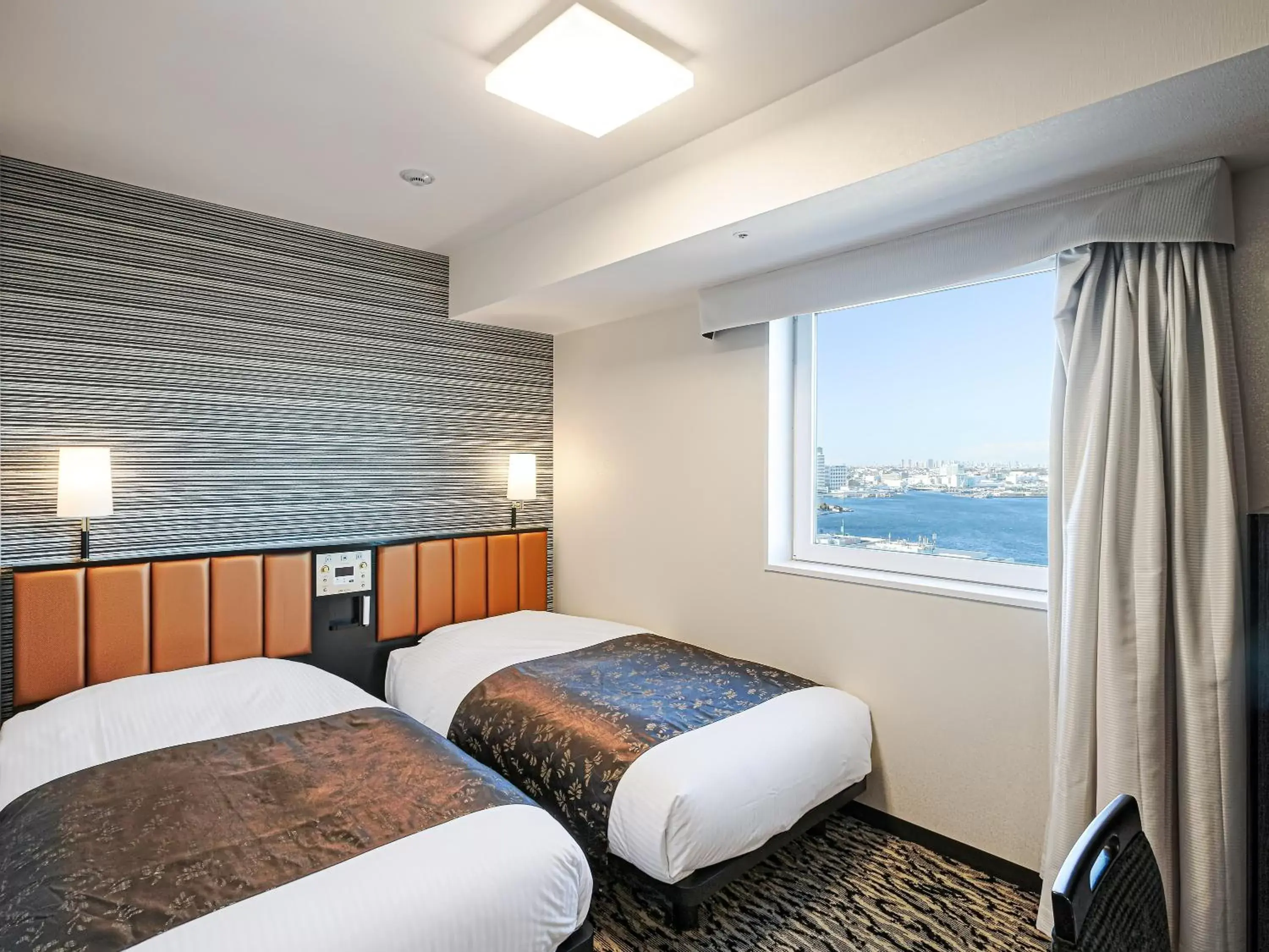 Photo of the whole room, Bed in APA Hotel & Resort Yokohama Bay Tower