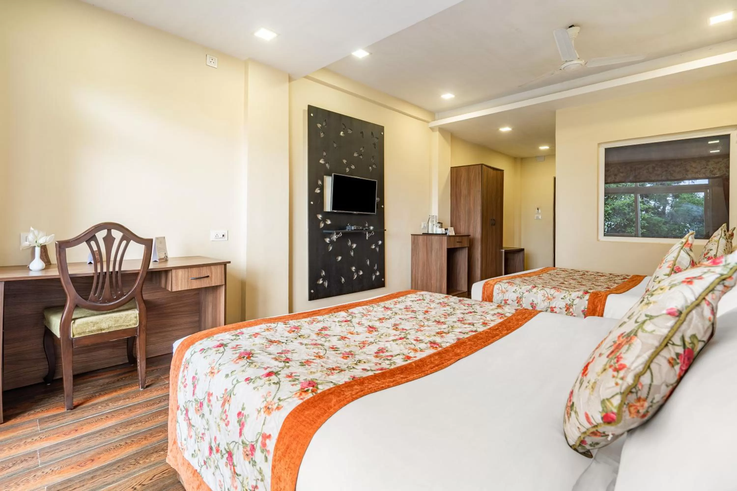 Bed in Summit Barsana Resort & Spa