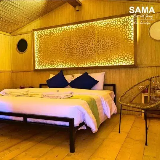 Bed in SAMA Ras Al Jinz Resort