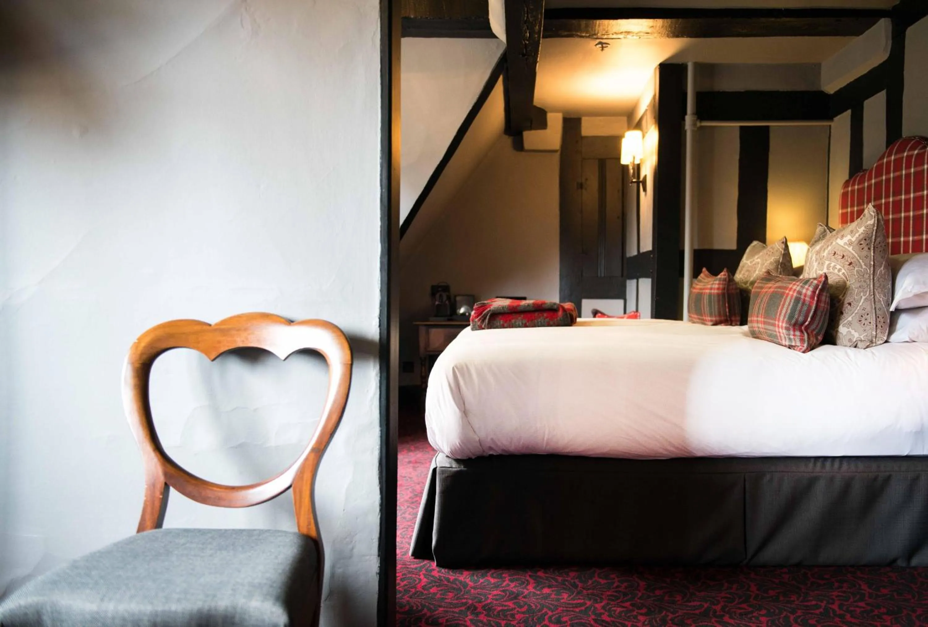Bed in The Lygon Arms - an Iconic Luxury Hotel