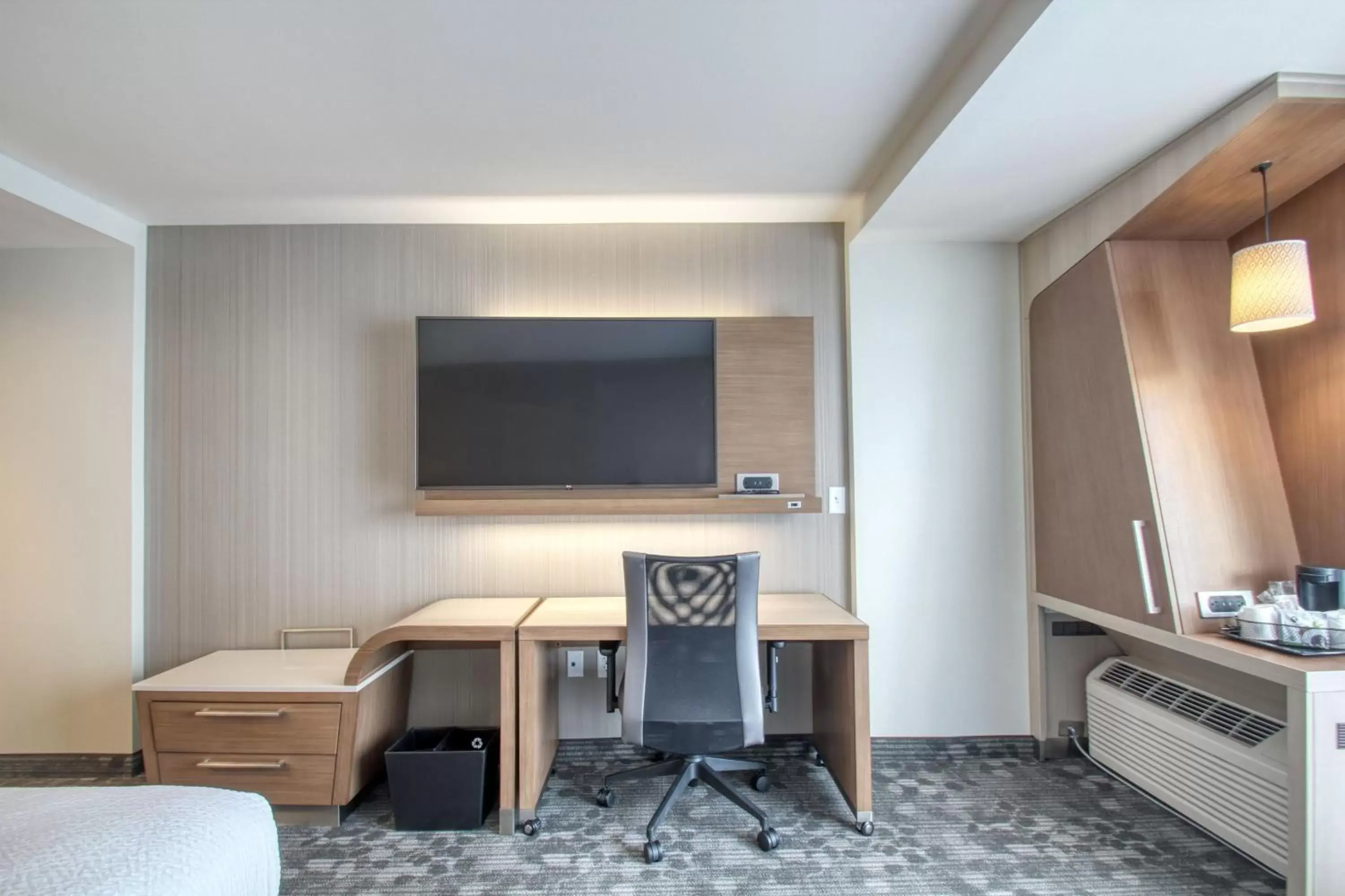 Photo of the whole room, TV/Entertainment Center in Courtyard by Marriott Fargo