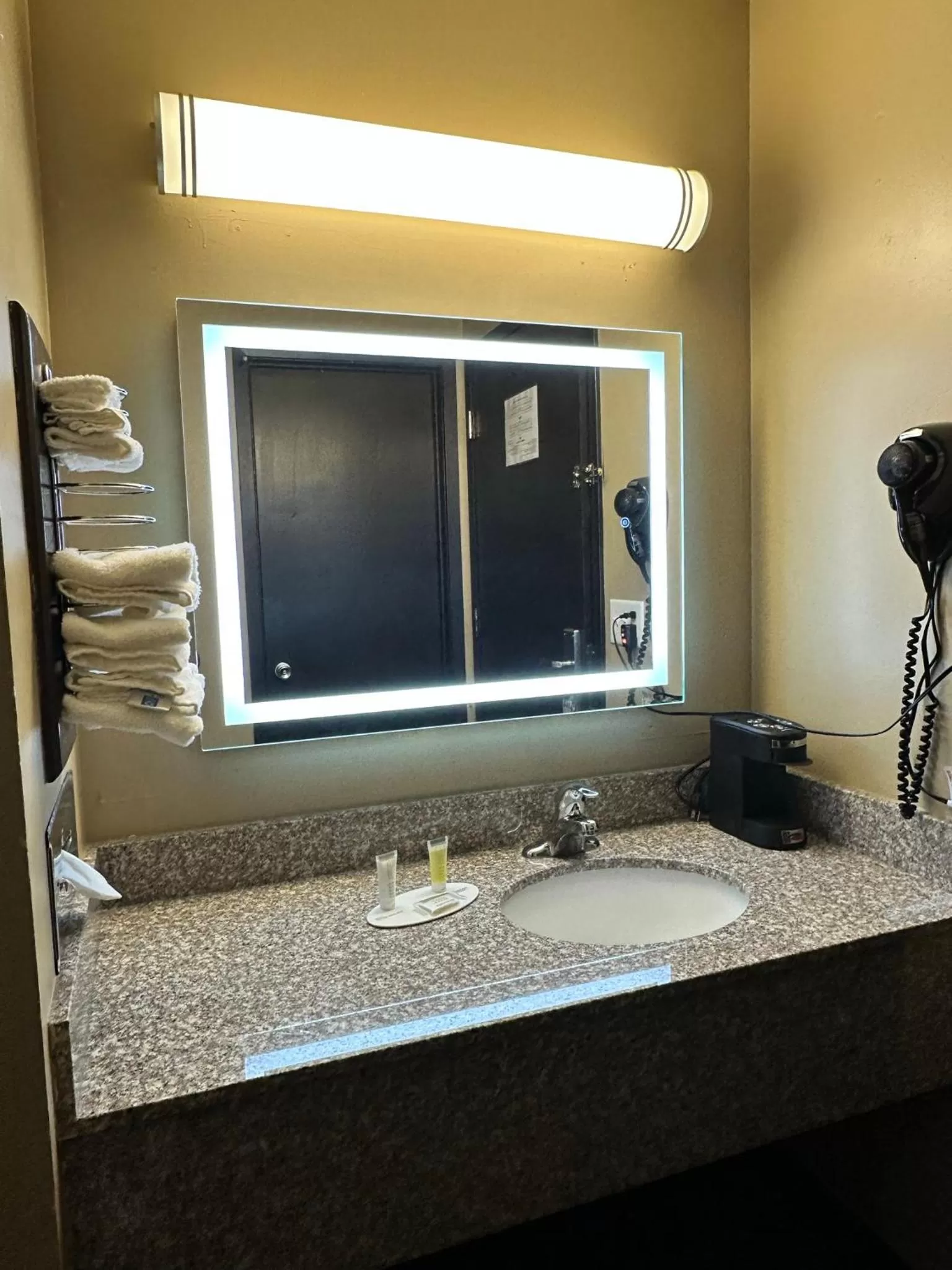 Bathroom in Super 8 by Wyndham Eau Claire WI