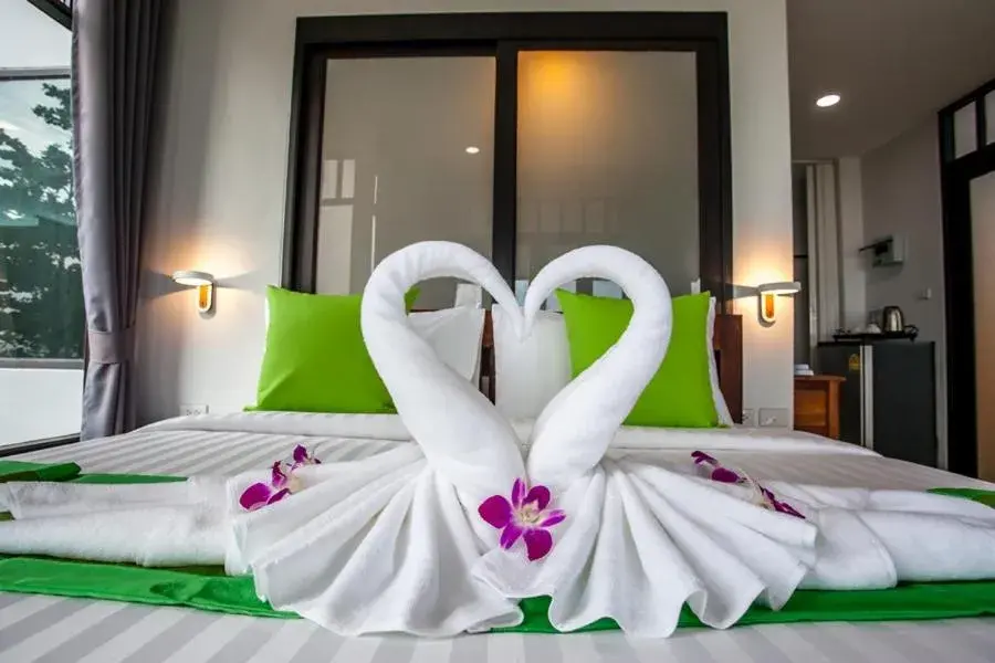 Bed in Lanta Corner Resort