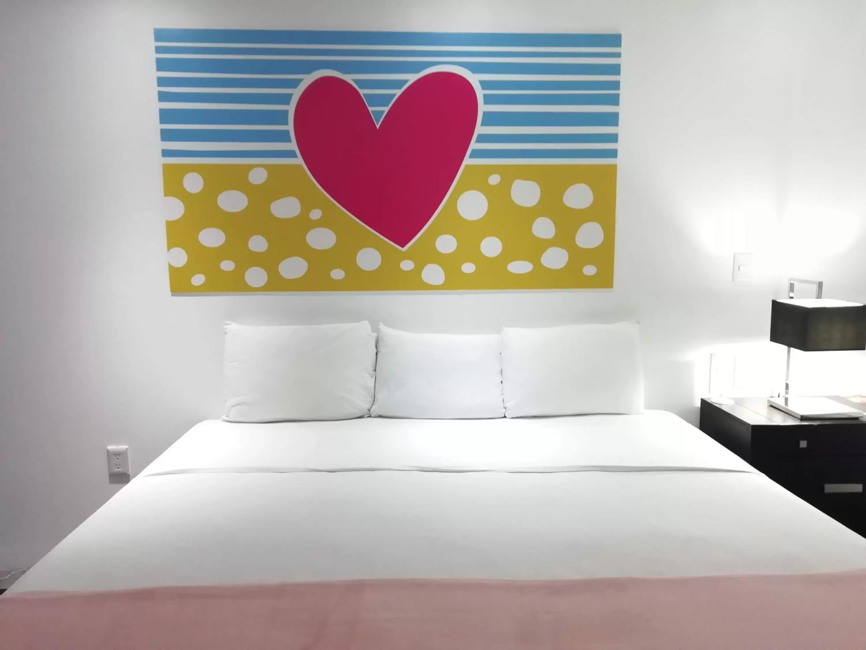 Bed in MayaFair Design Hotel