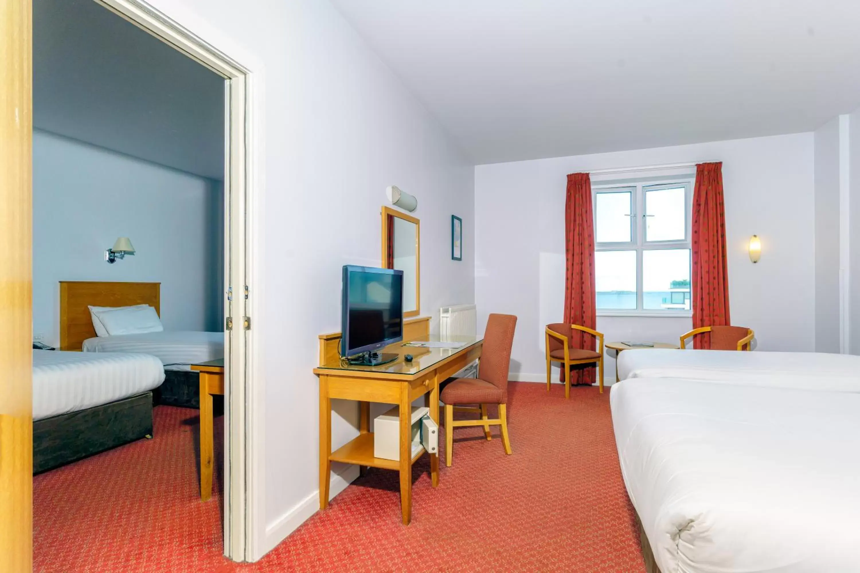 Bedroom, TV/Entertainment Center in Portrush Atlantic Hotel