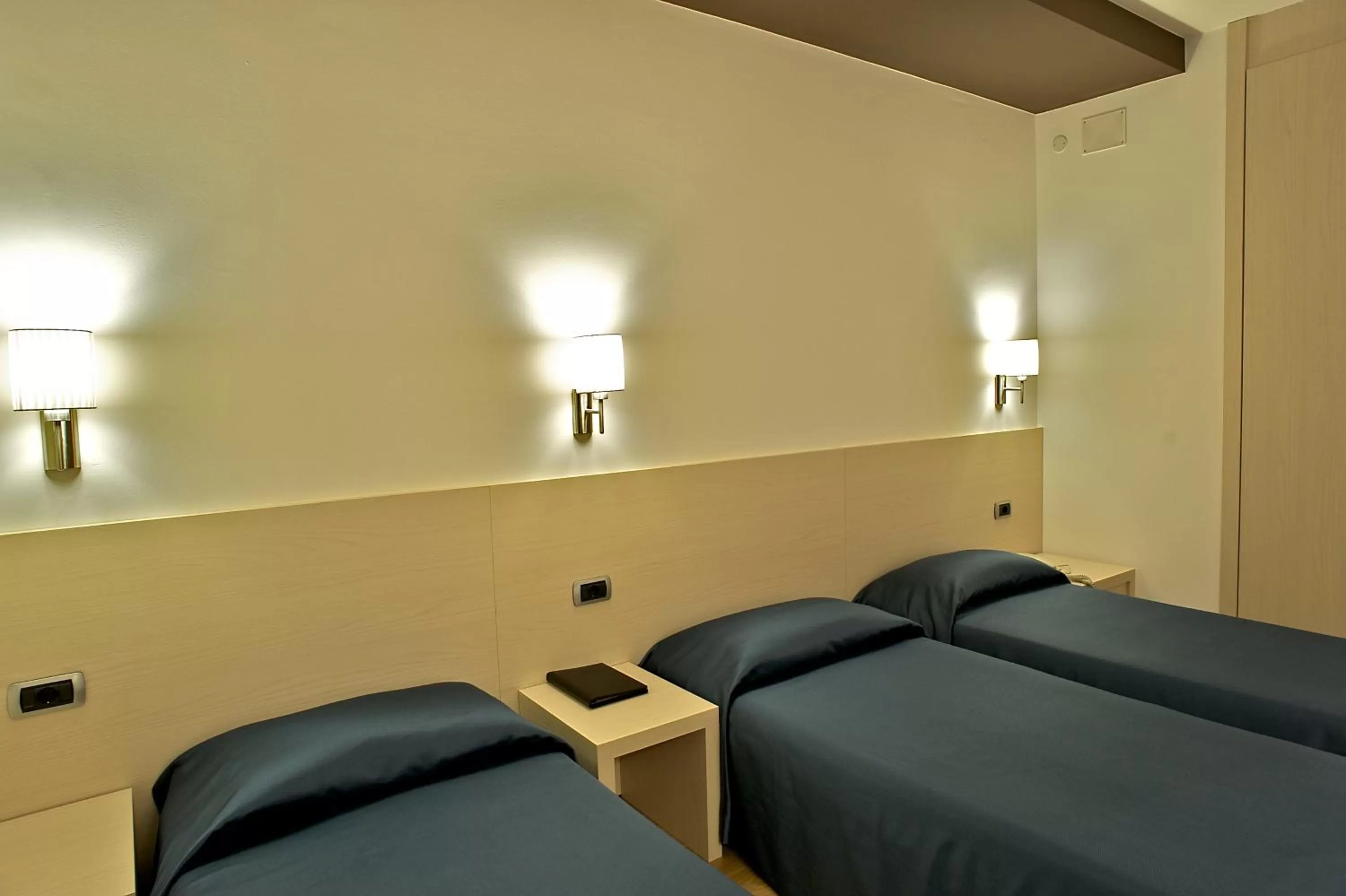 Bedroom in Sam Hotel