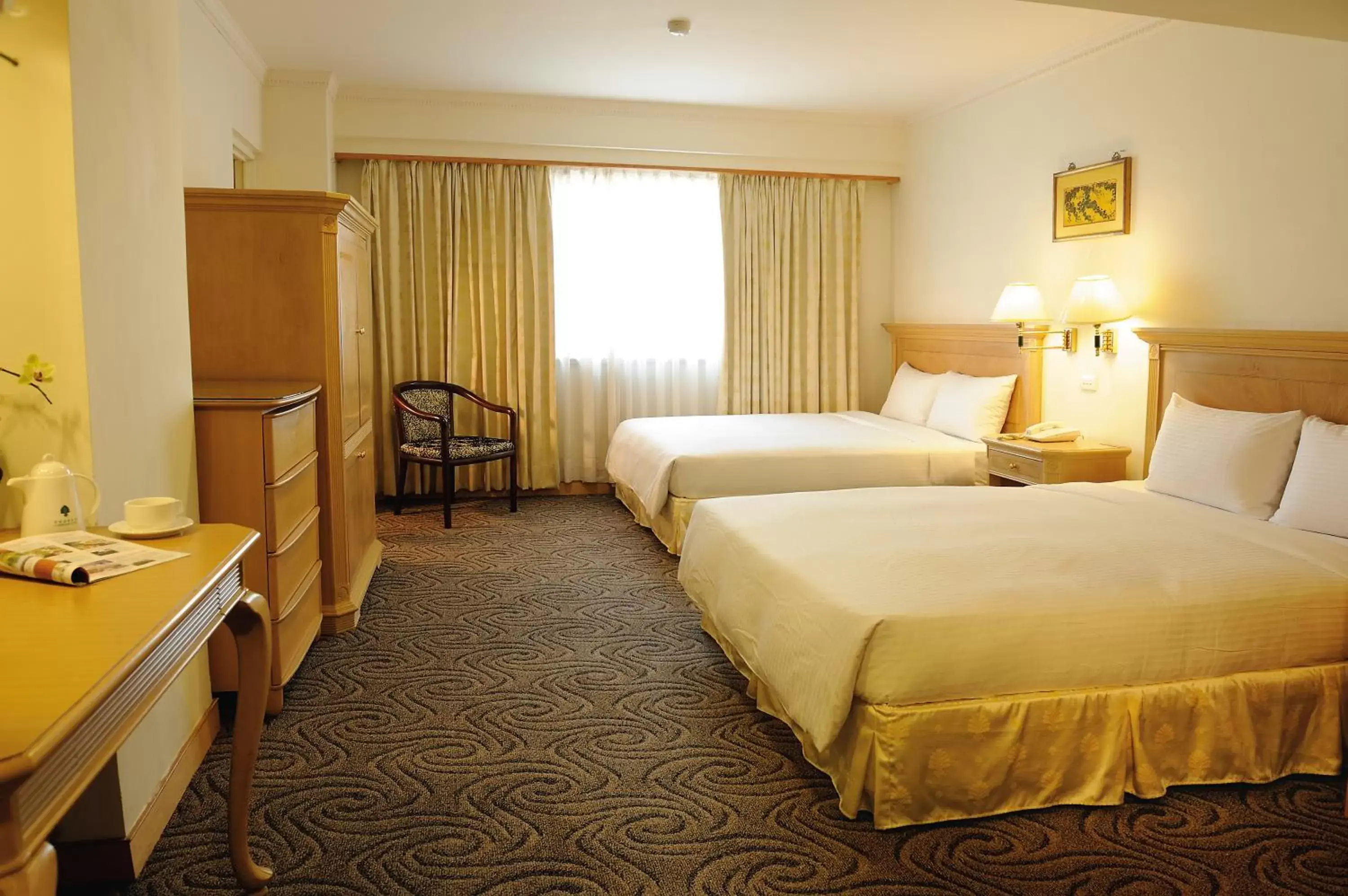 Photo of the whole room, Bed in Cambridge Tainan Hotel