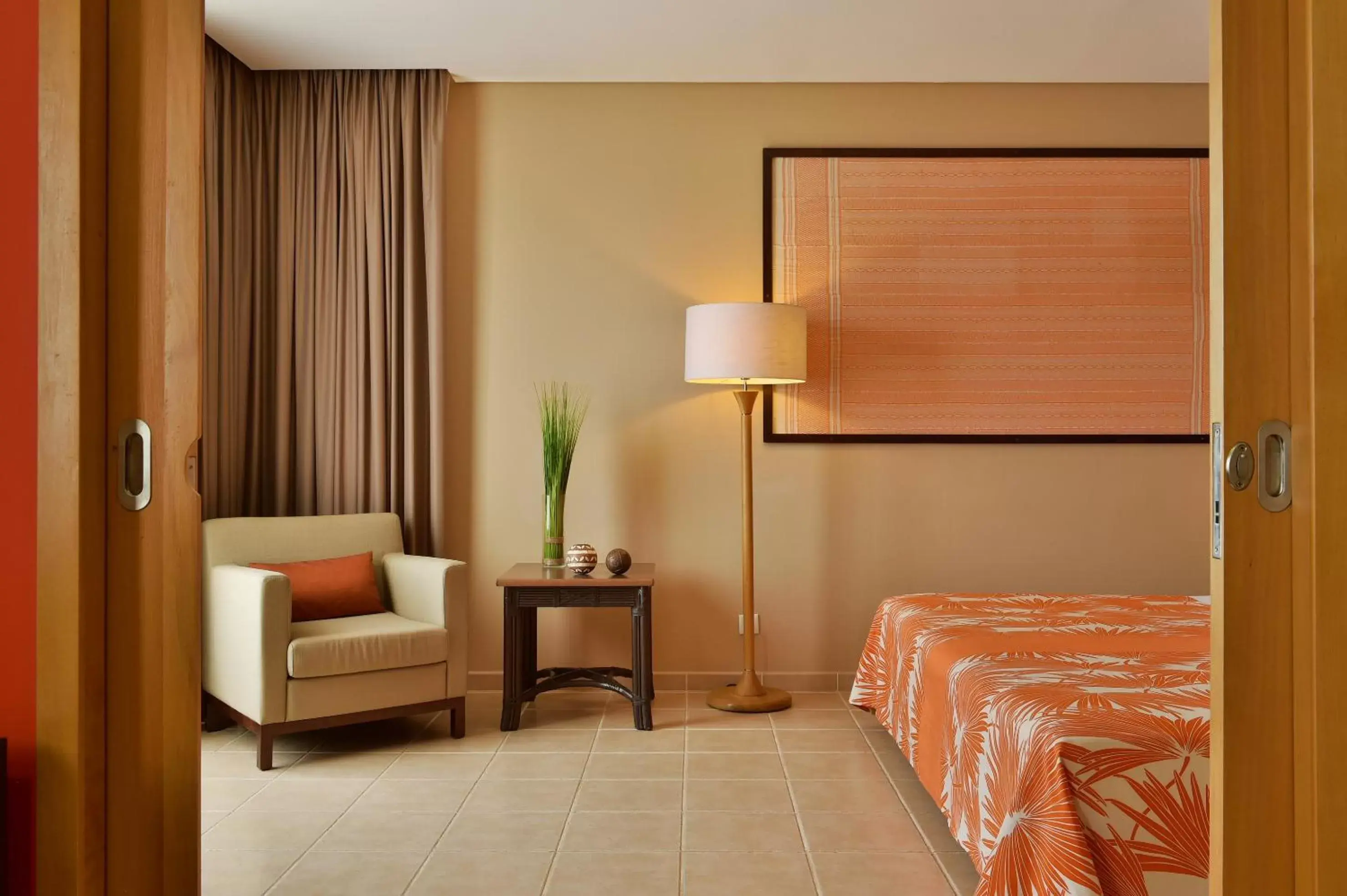 Bedroom, Seating Area in Pestana Tropico Ocean & City Hotel