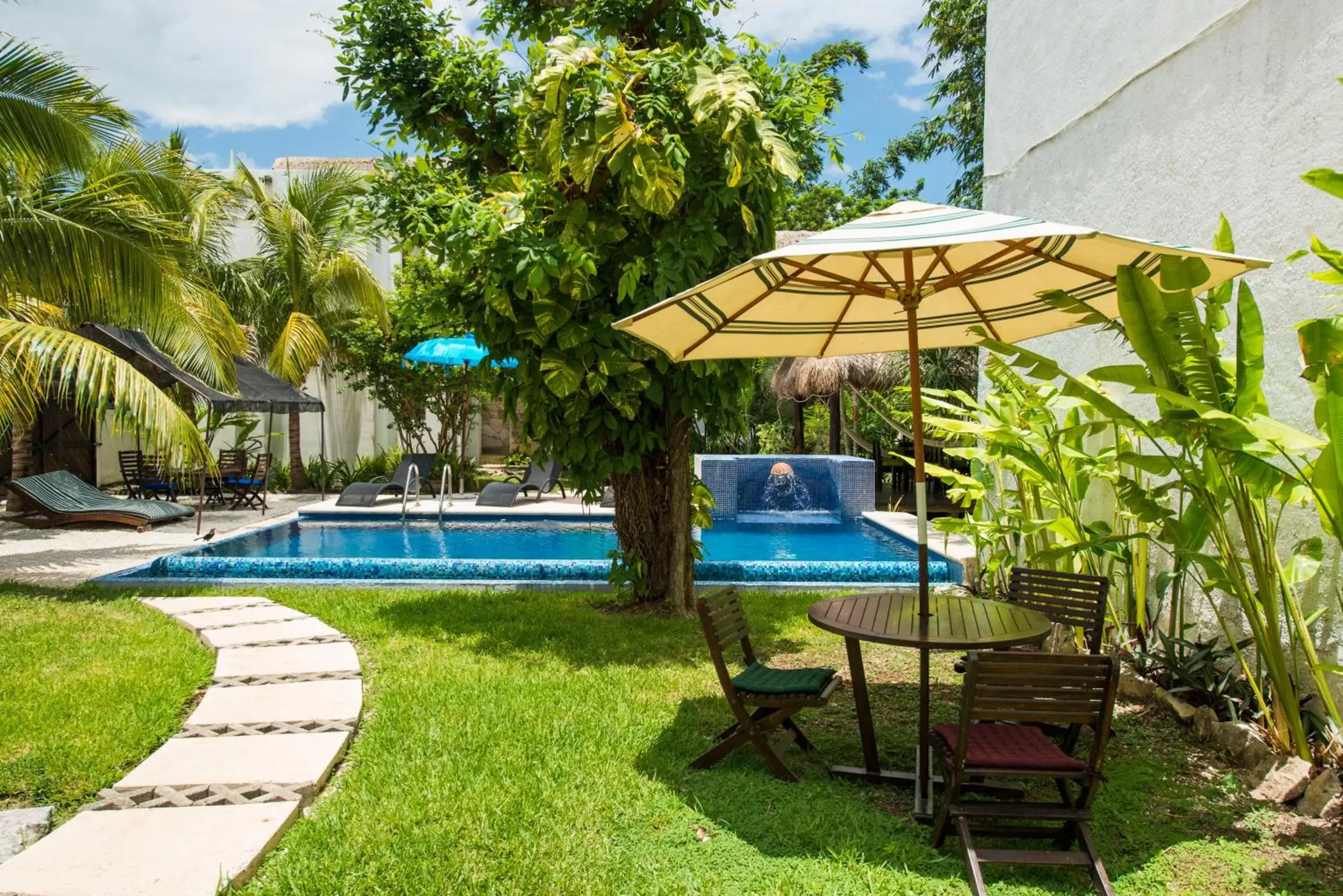 Garden, Swimming Pool in Villas El Encanto Cozumel