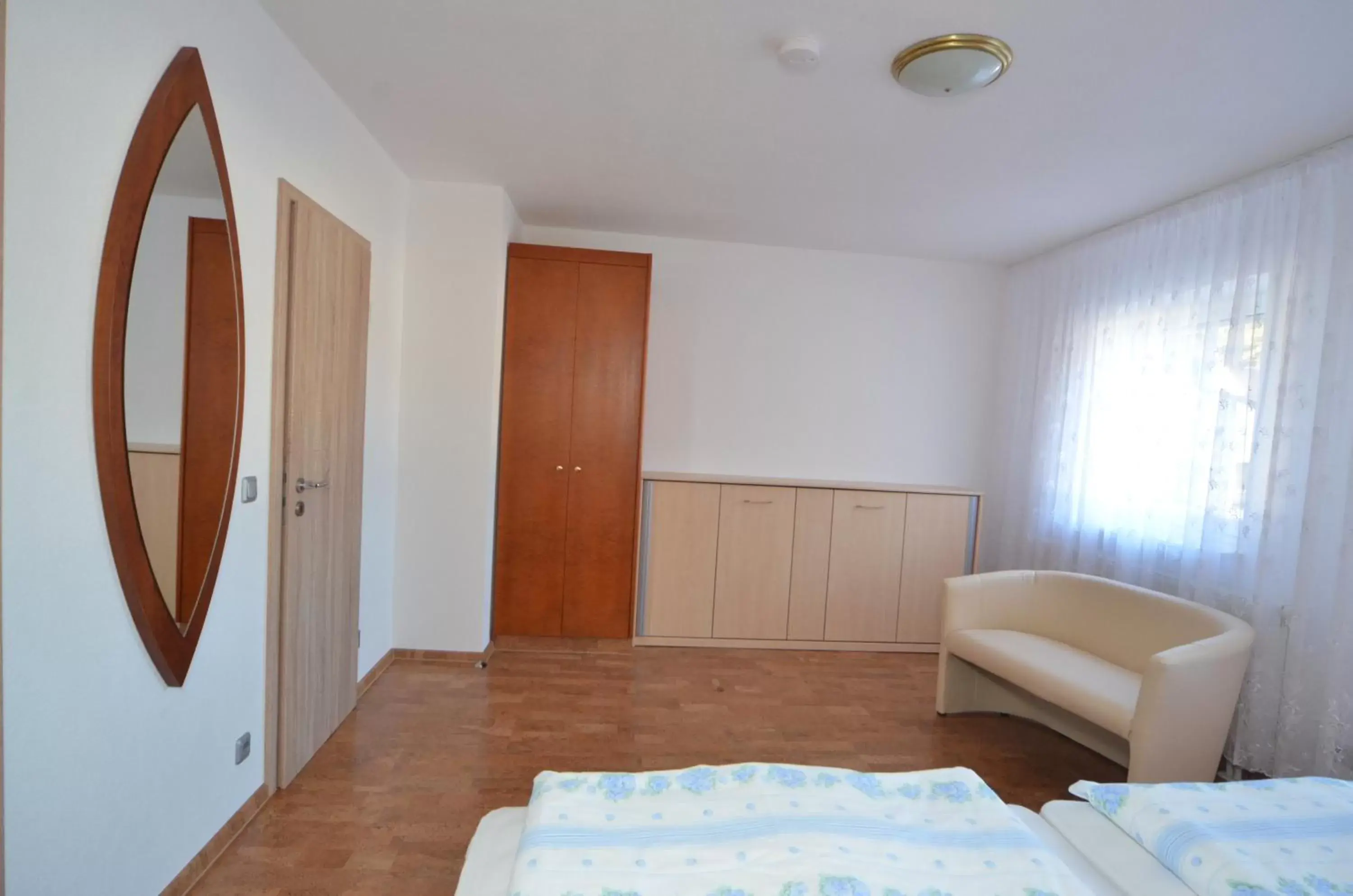 Bedroom, Seating Area in Land-Hotel Am Wald Garni