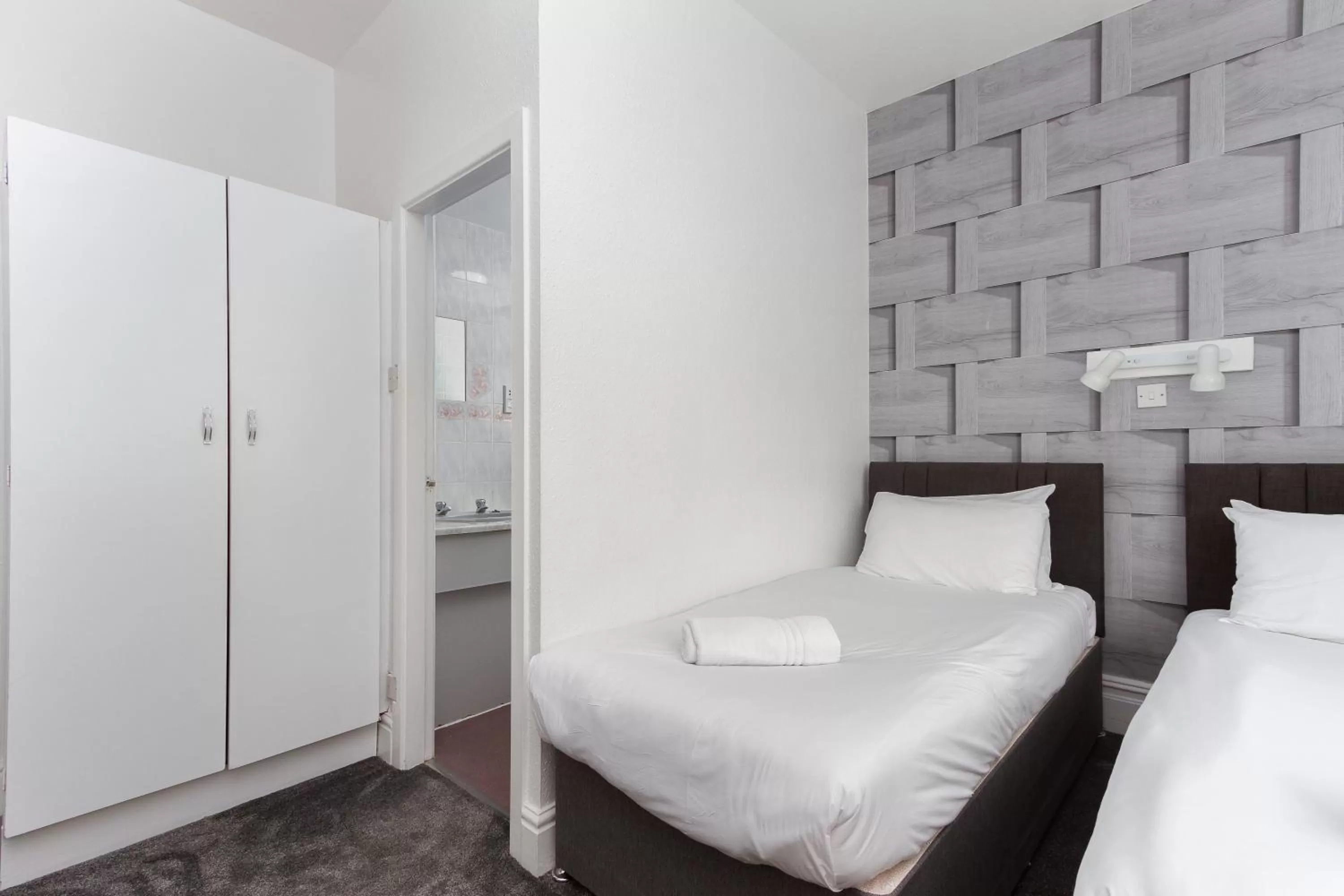 Bedroom, Bed in The Sandringham Court Hotel & Apartment Welcoming Large and Small Groups for 15 years