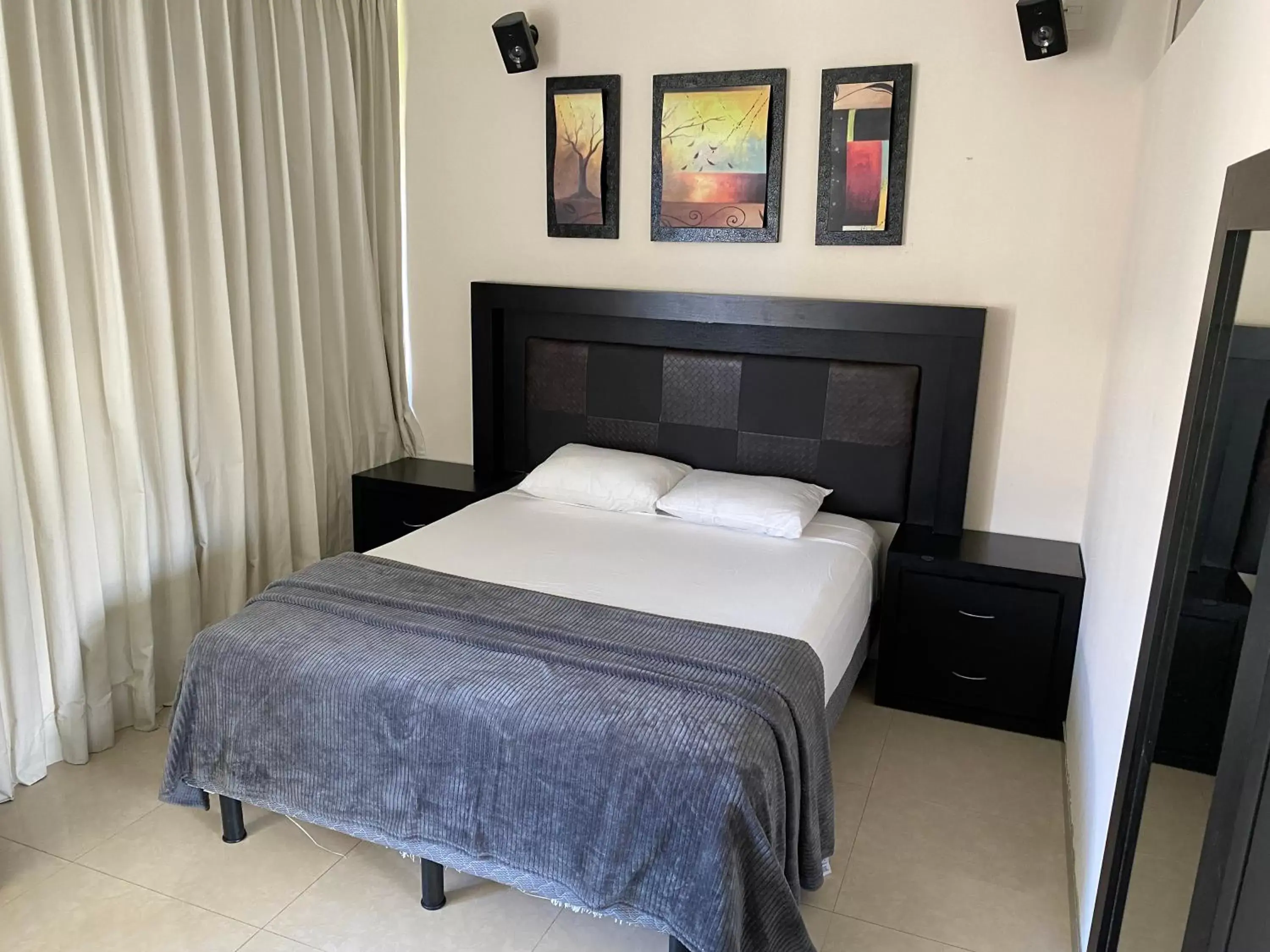 Bedroom, Bed in Condos inside an Ocean Front Hotel Resort