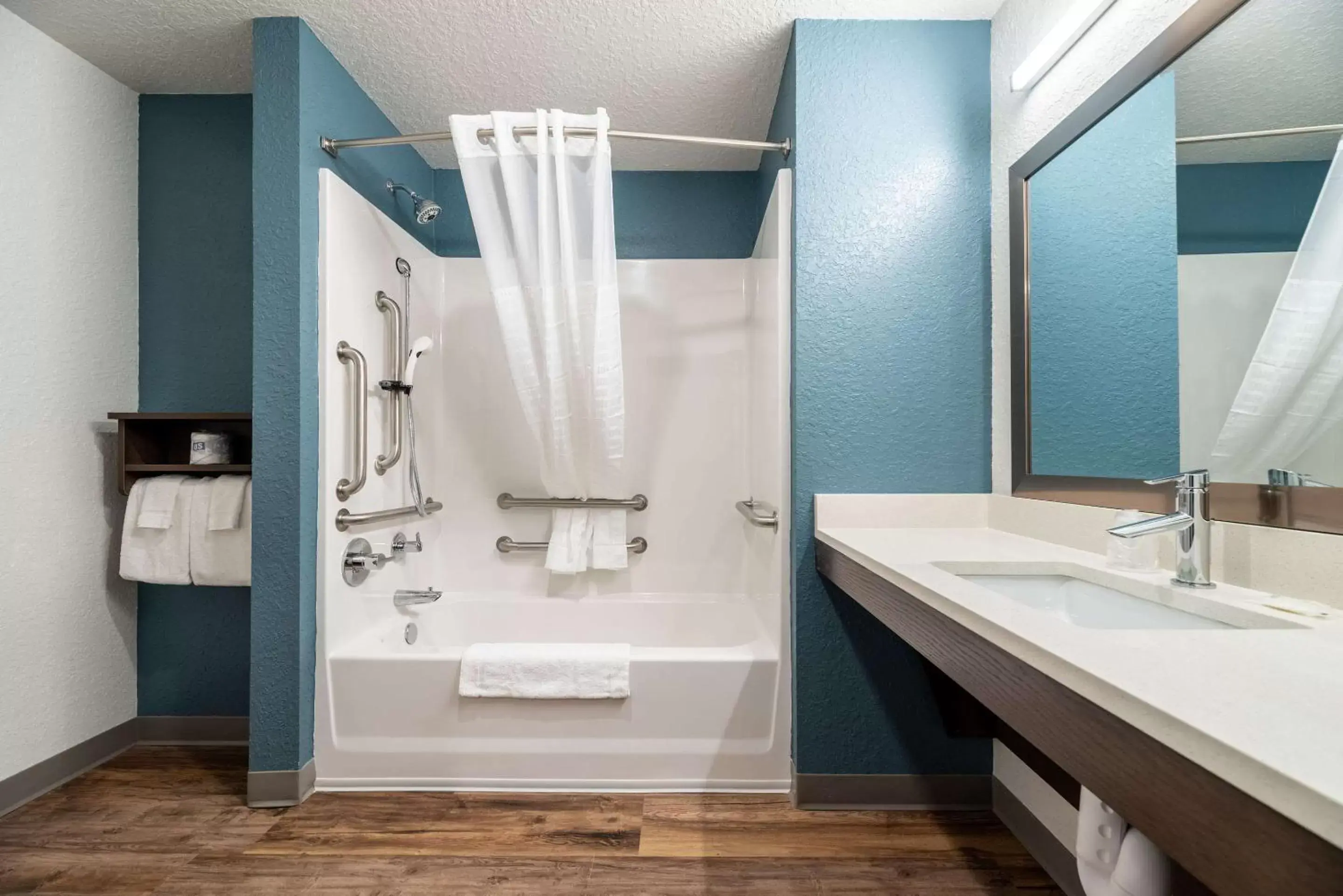 Bathroom in WoodSpring Suites Sanford North I-4 Orlando Area