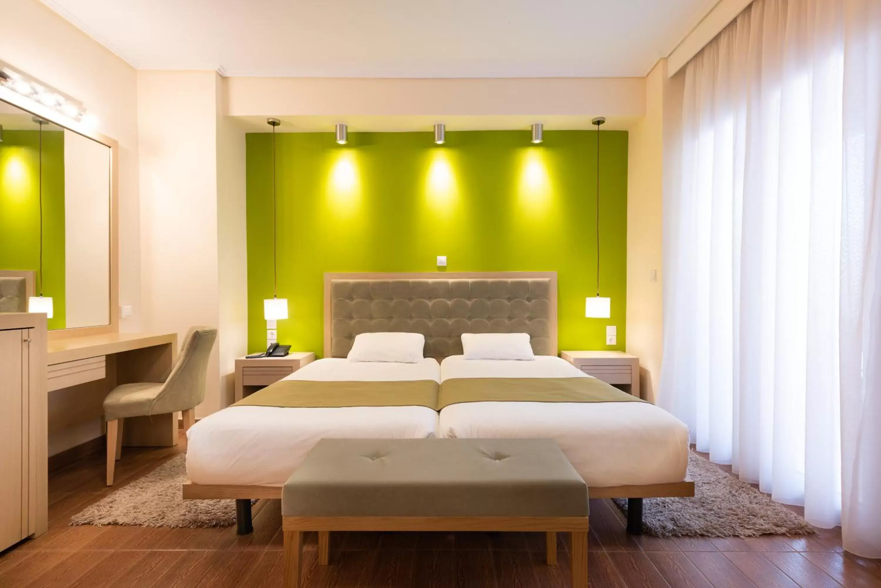 Bedroom, Bed in Heliotrope Hotels