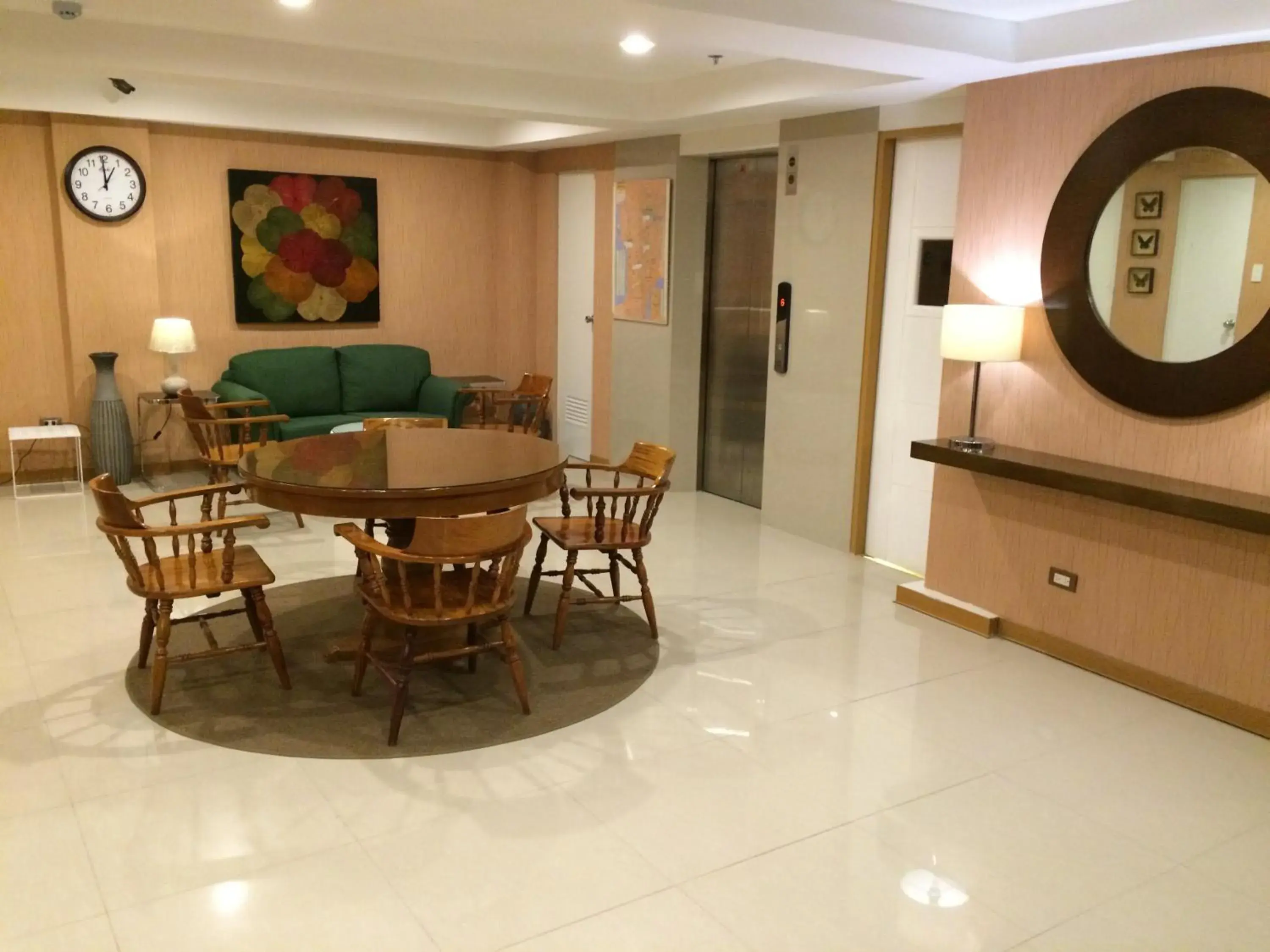 Communal lounge/ TV room in Stone House Hotel Pasay