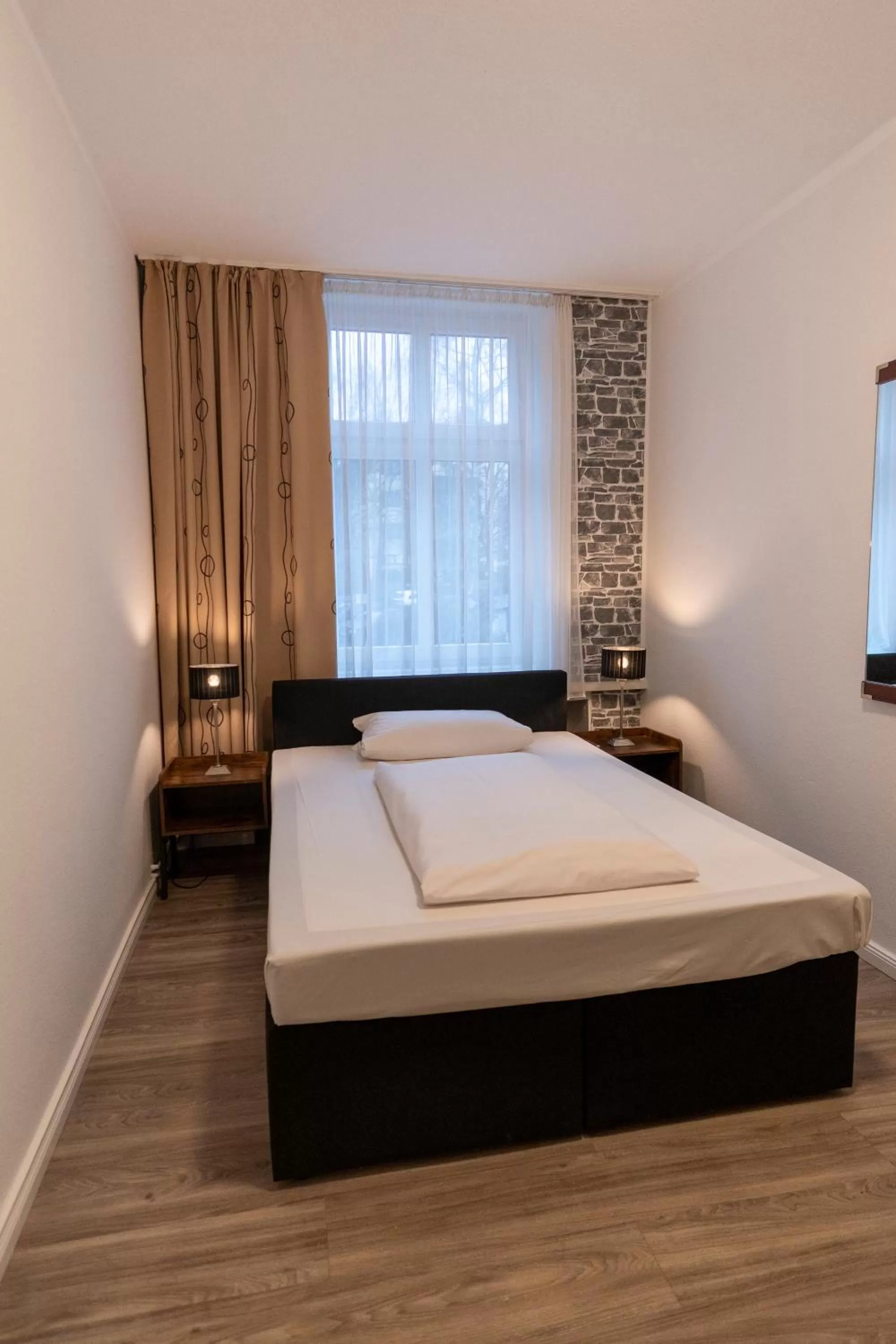 Bed in Hotel Berliner Hof