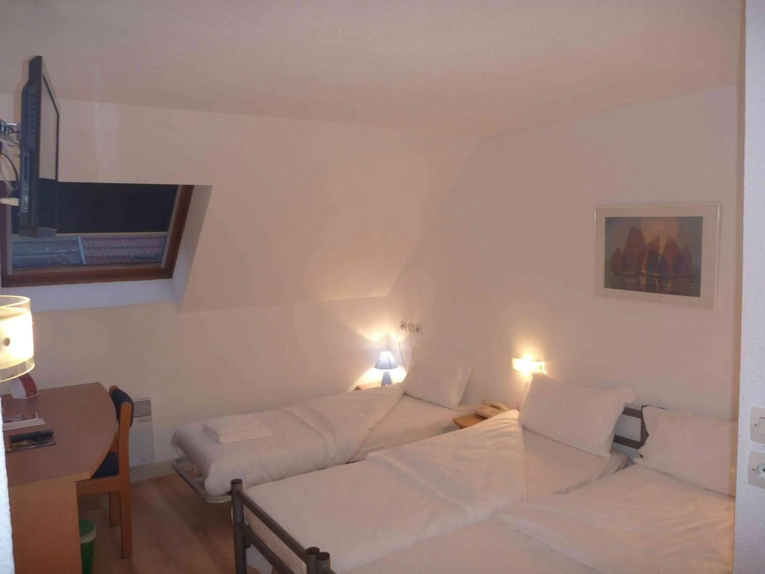 Photo of the whole room, Bed in Hotel Primo Colmar Centre