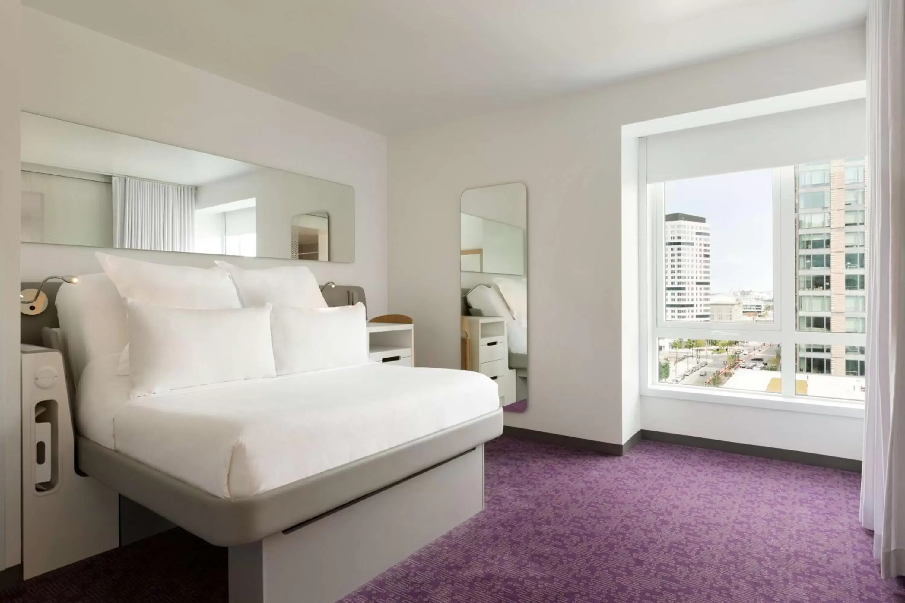 Photo of the whole room, Bed in YOTEL Boston