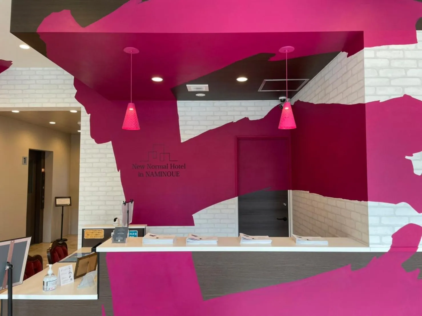 Lobby or reception in New Normal Hotel in NAMINOUE ニューノーマルホテルイン波の上