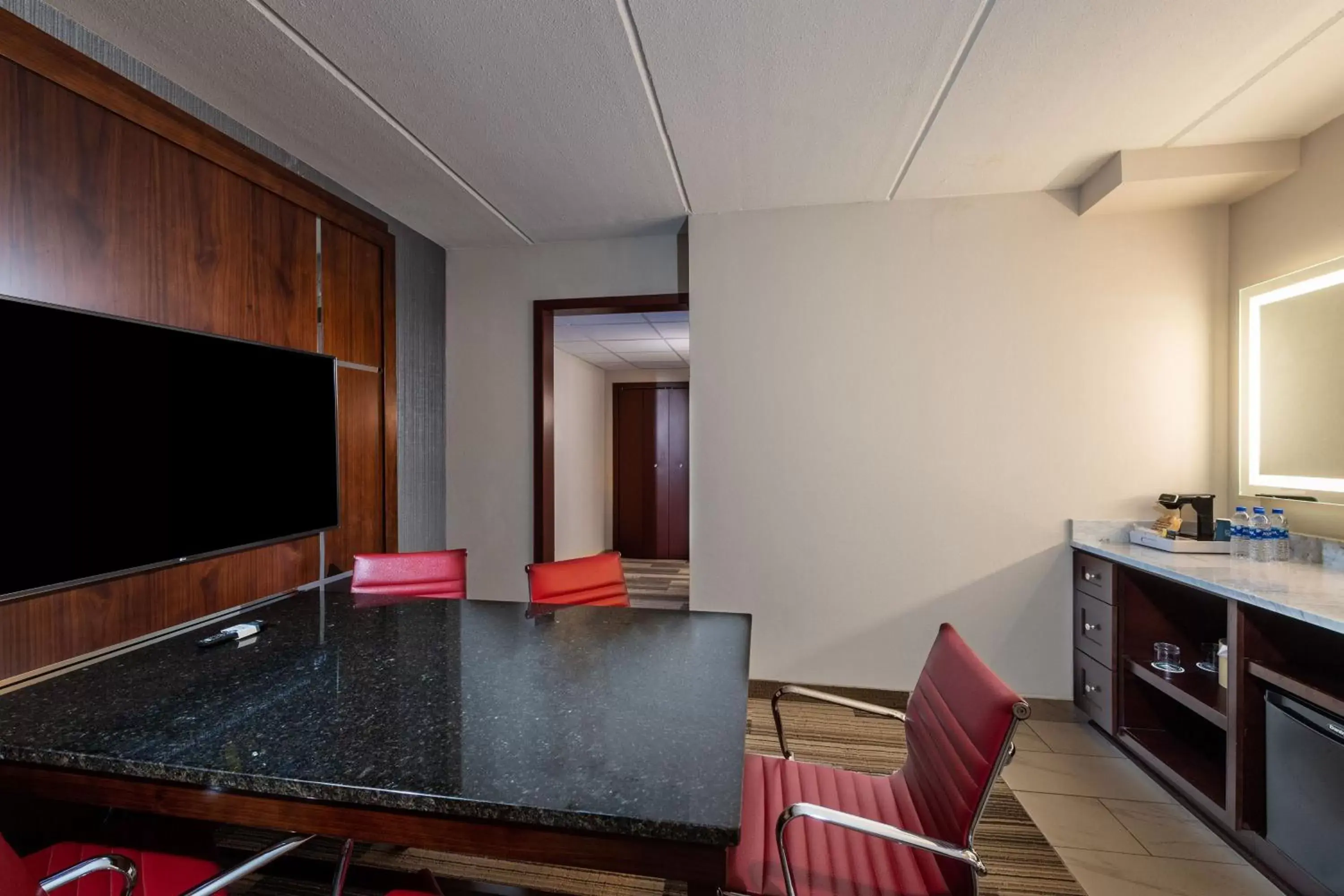 Photo of the whole room, TV/Entertainment Center in Four Points by Sheraton Atlanta Airport West