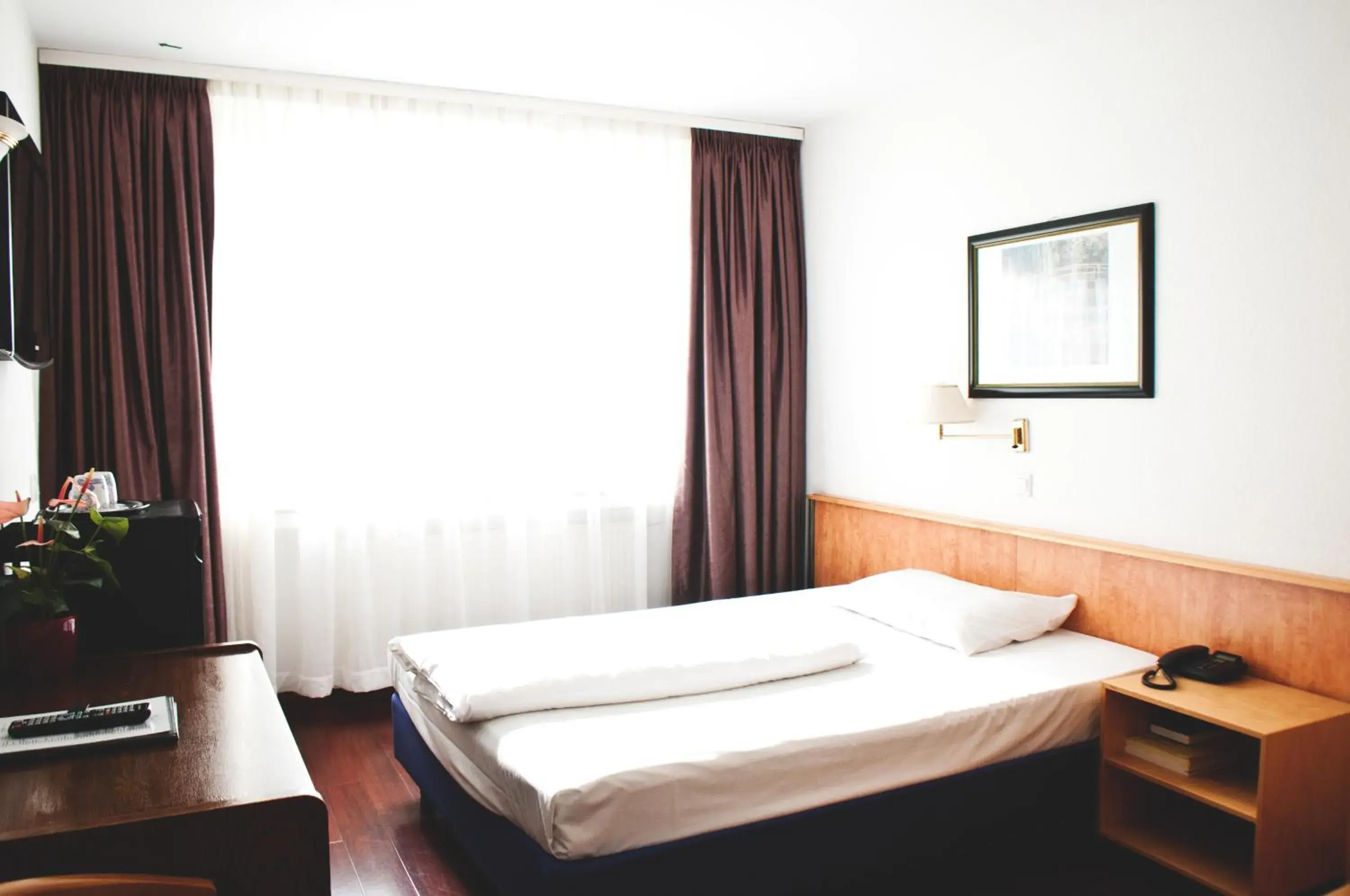 Photo of the whole room, Bed in Hotel Batavia Photo of the whole room, Bed in Hotel Batavia