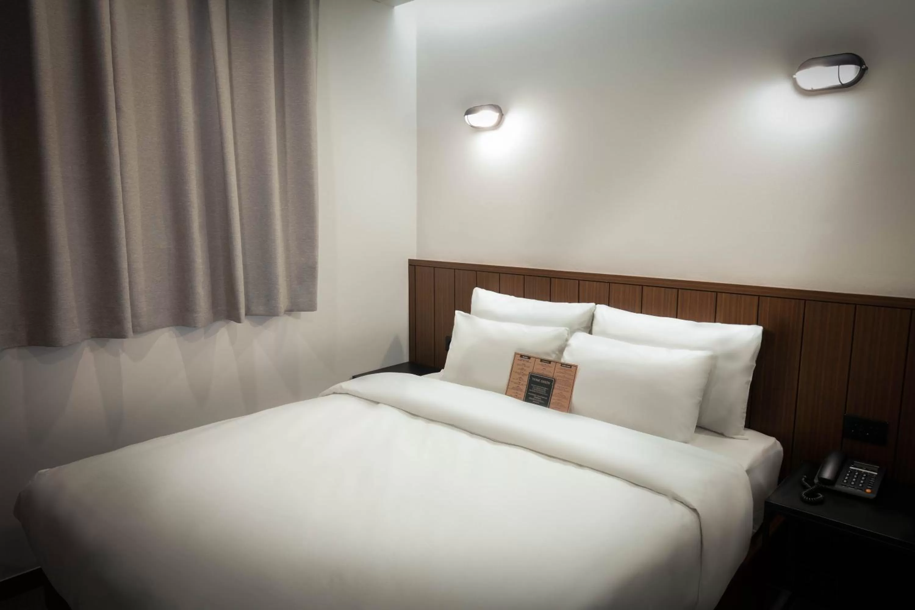 Bed in Hotel Lumia Myeongdong
