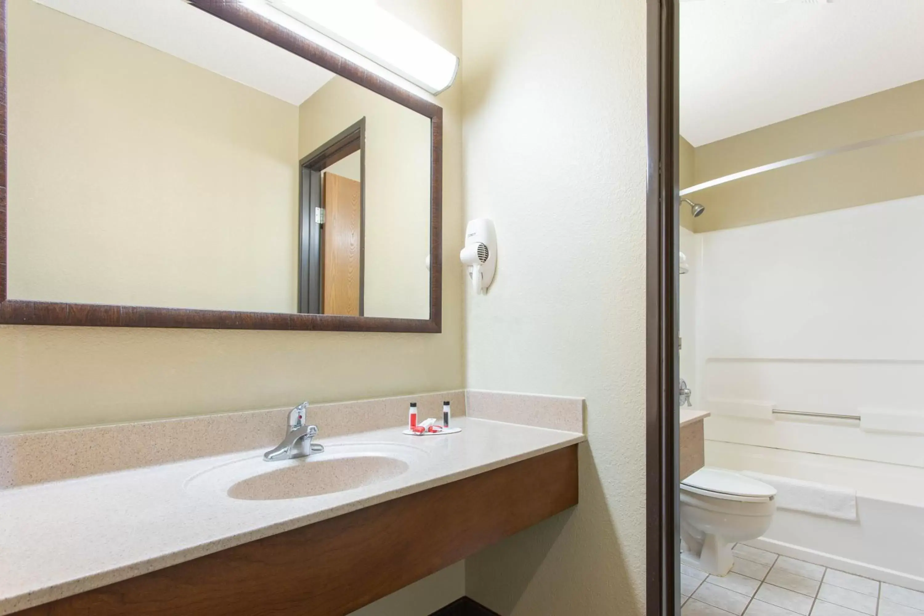 Bathroom in Super 8 by Wyndham Weston WV