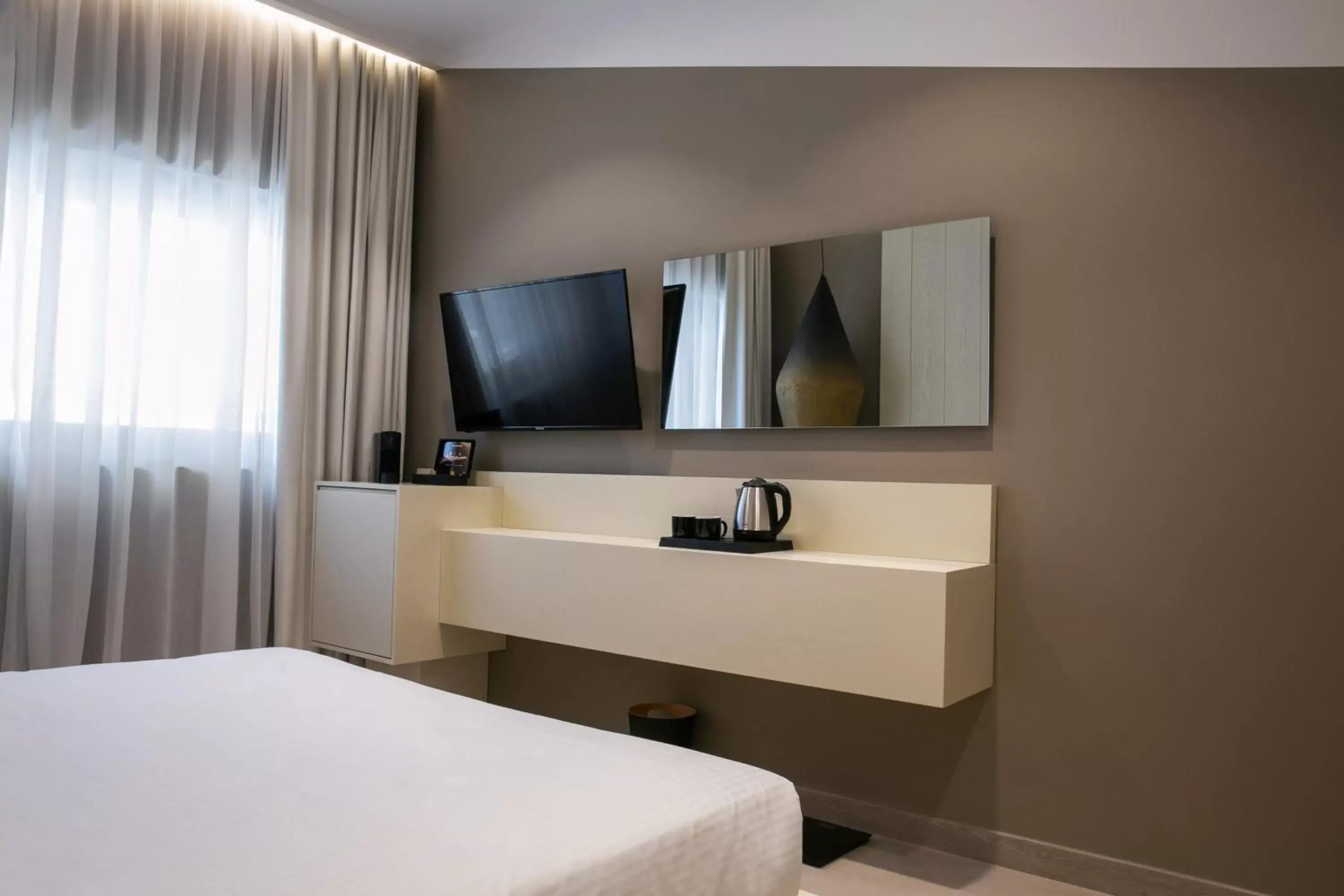 TV and multimedia, TV/Entertainment Center in Elisabeth Boutique Hotel