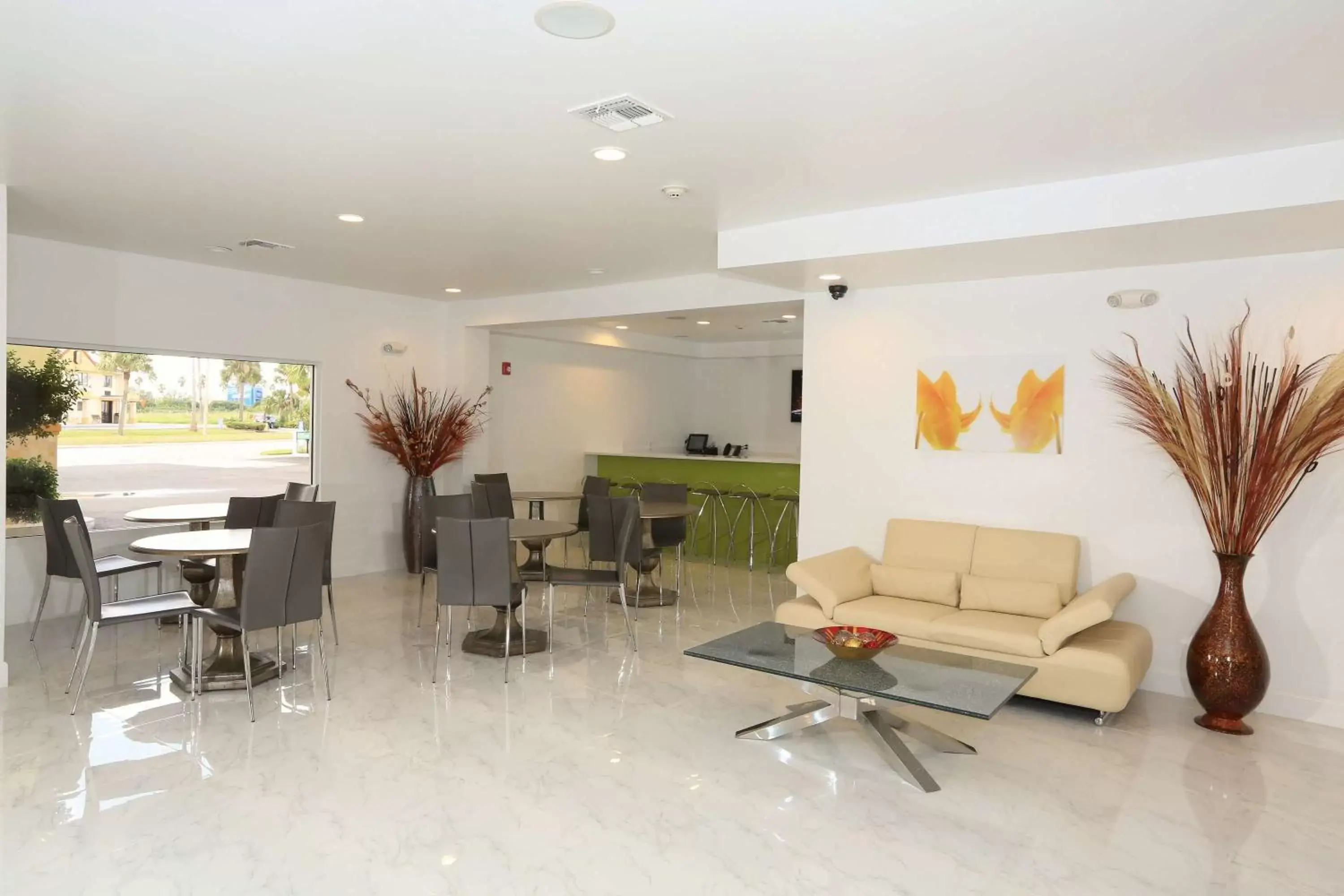 Lobby or reception in SureStay Plus by Best Western Orlando International Drive
