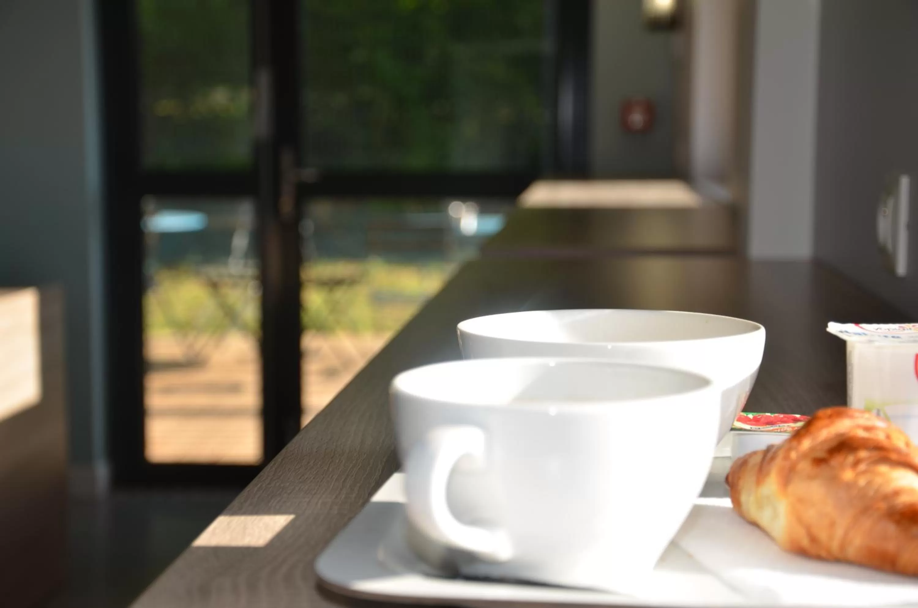 Continental breakfast in Eklo Hotels Le Mans