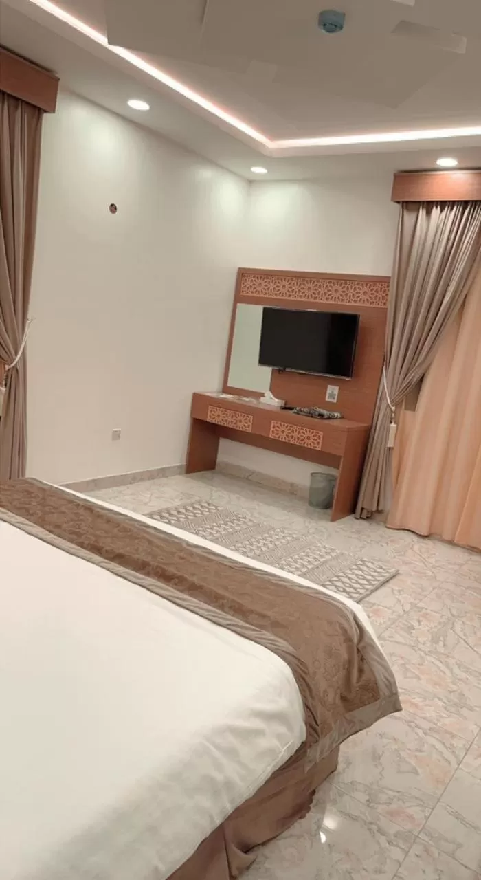 TV and multimedia, Bed in Taj Aleiman Hotel 