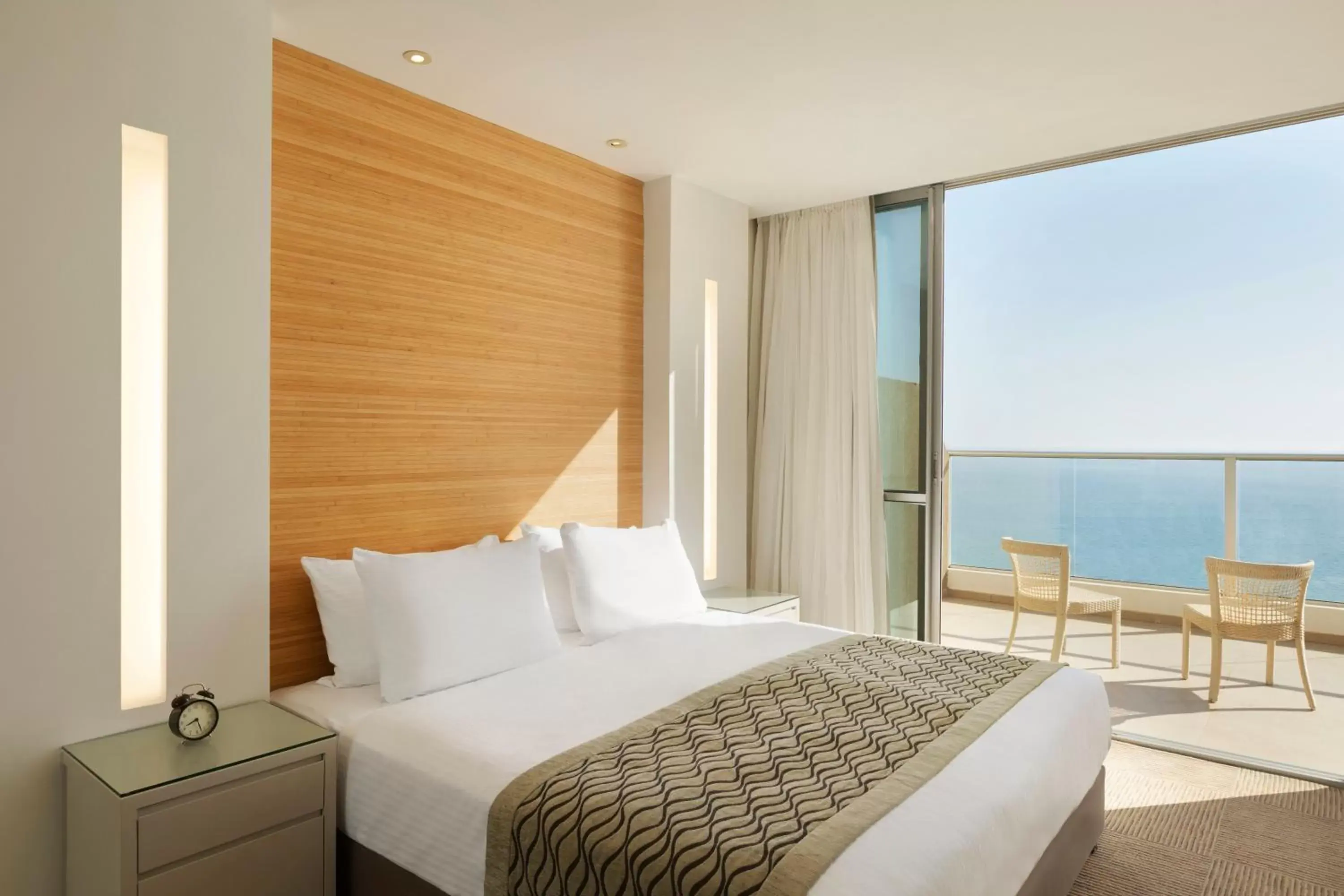 Bed in Ramada Hotel & Suites by Wyndham Netanya