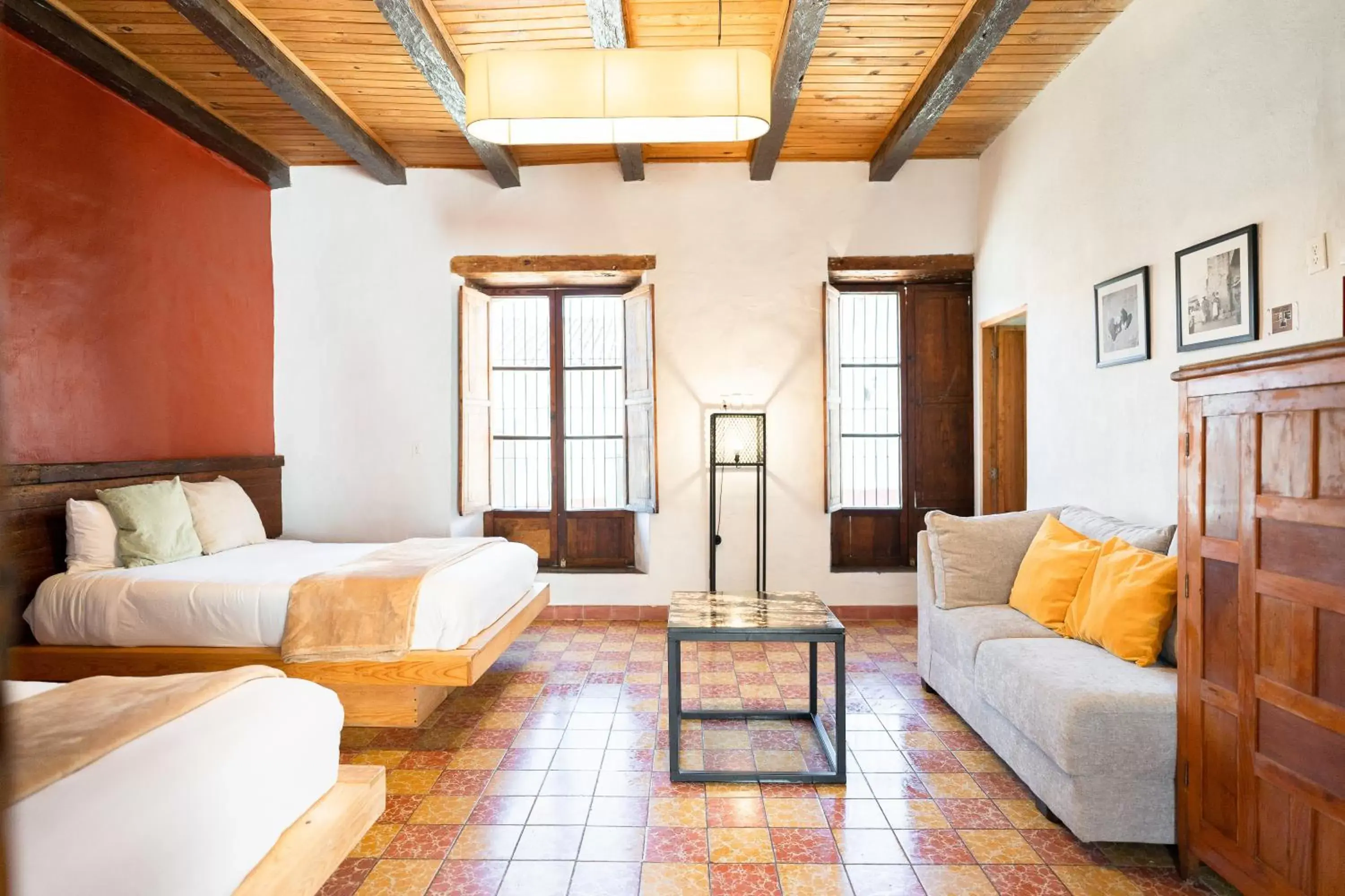 Bed, Seating Area in Casa I. Madero