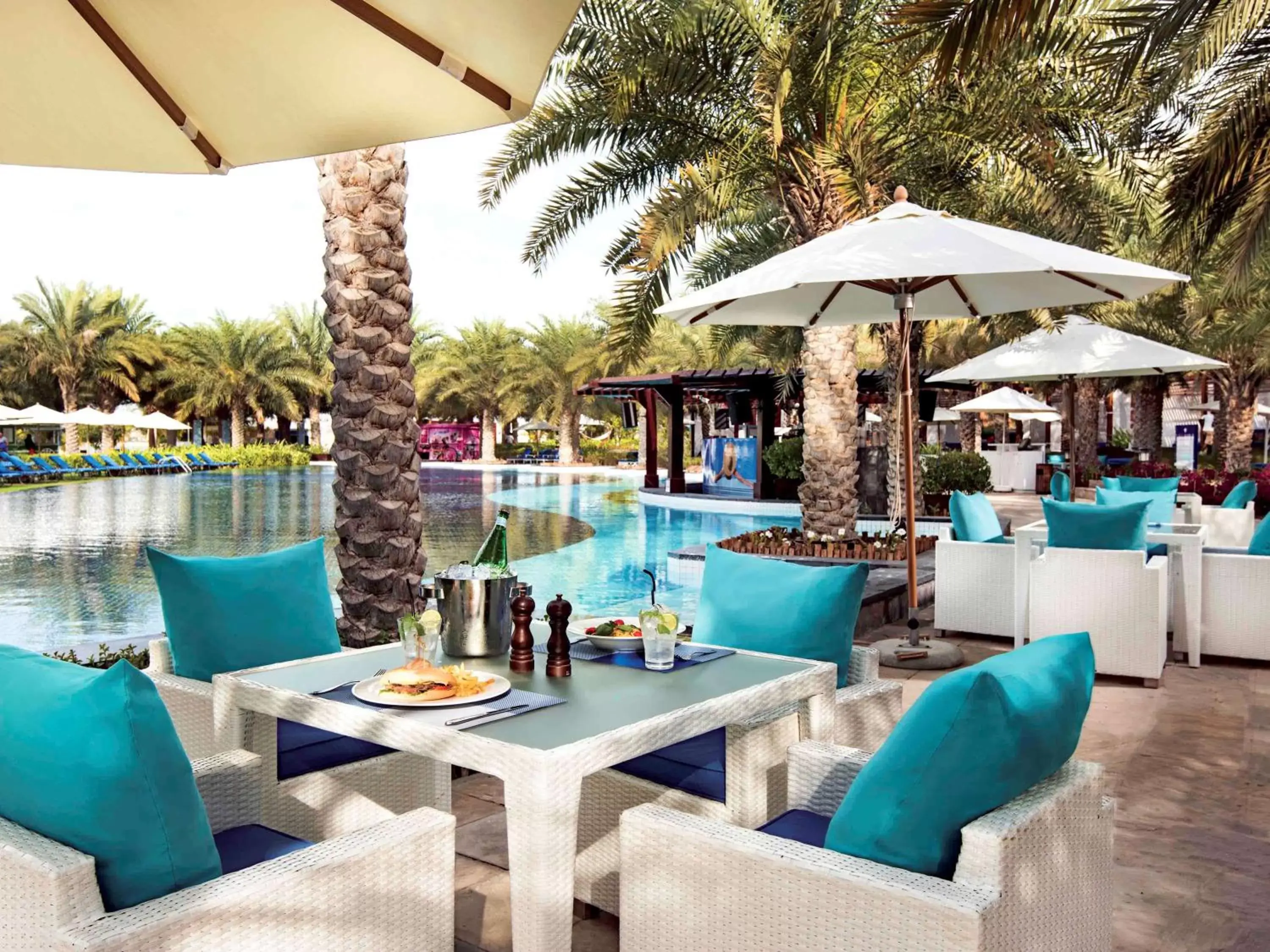Lounge or bar, Swimming Pool in Rixos The Palm Hotel & Suites - Ultra All Inclusive