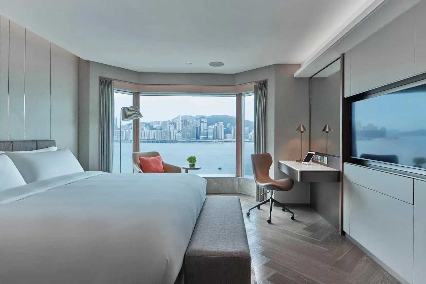 Bedroom in New World Millennium Hong Kong Hotel