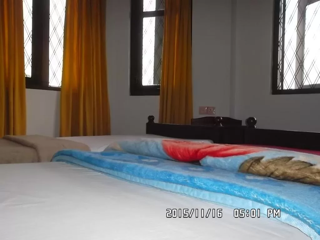 Bed in Panorama Accommodations Nuwara Eliya