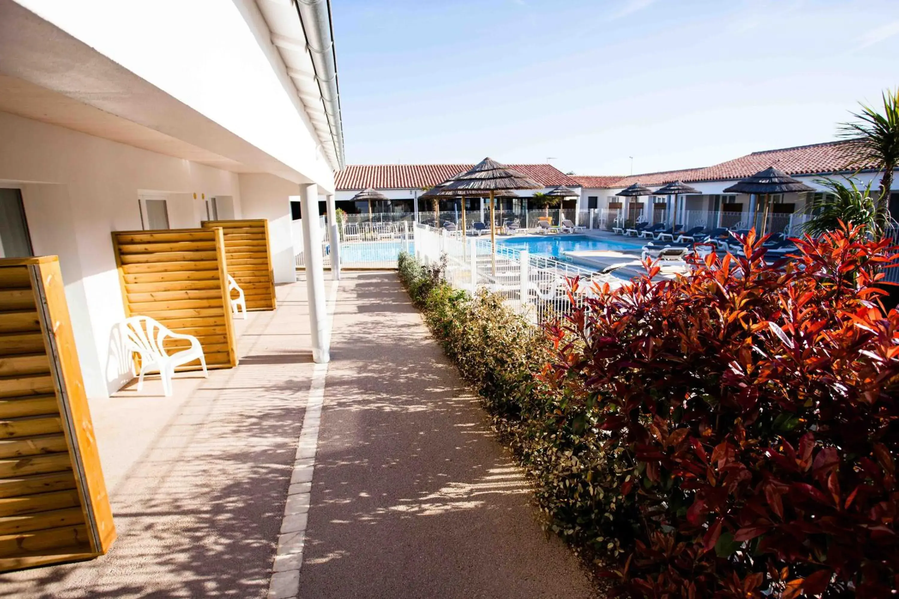 Patio, Swimming Pool in Hotel de Re, The Originals Boutique