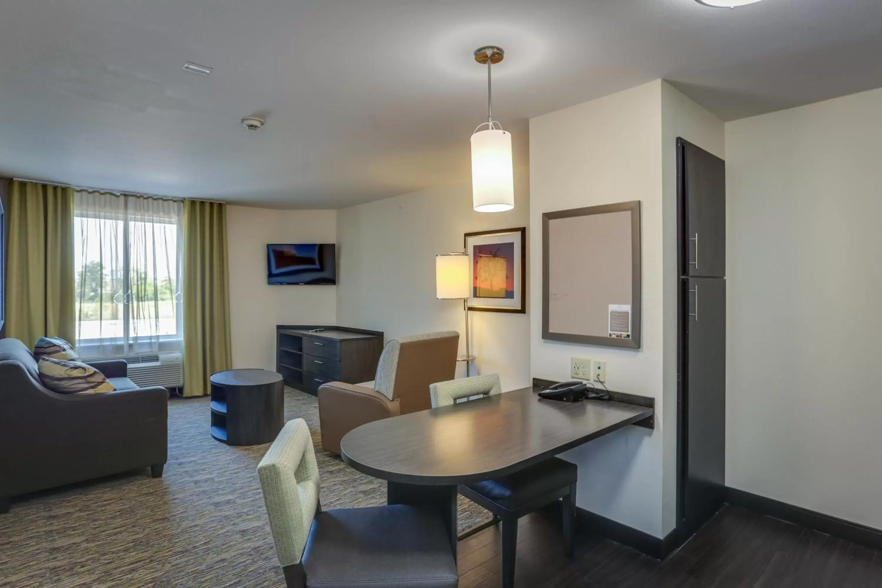 Photo of the whole room, Dining Area in Candlewood Suites College Station, an IHG Hotel