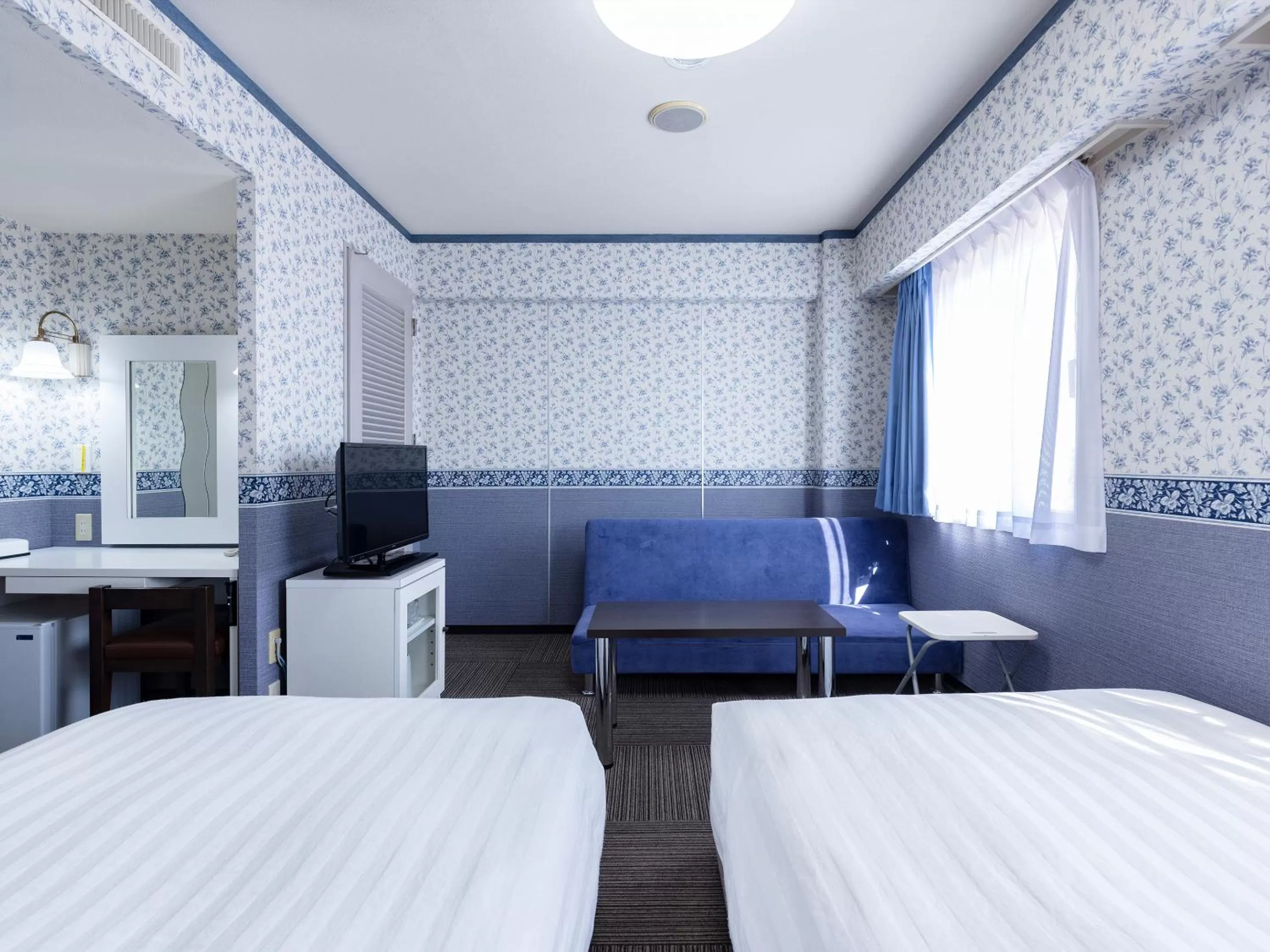 Photo of the whole room, Bed in KOKO STAY Shimonoseki - formerly Hotel Wing International Shimonoseki